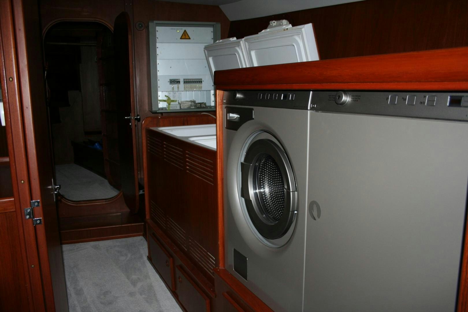 a washing machine in a room aboard SINDBAD Yacht for Sale