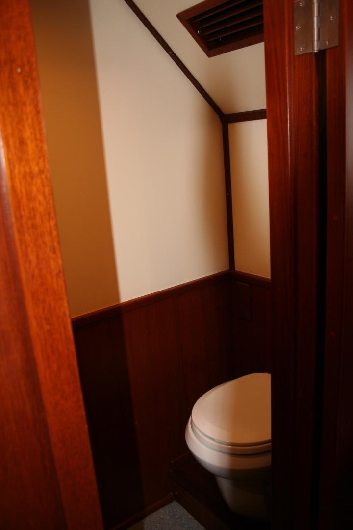 a toilet in a bathroom aboard SINDBAD Yacht for Sale