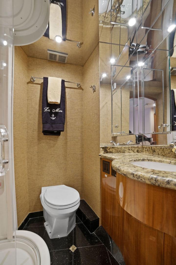 a bathroom with a sink and a toilet aboard LA MER Yacht for Sale