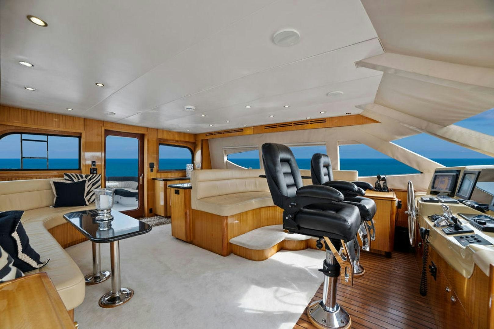 a room with a couch and a desk aboard LA MER Yacht for Sale