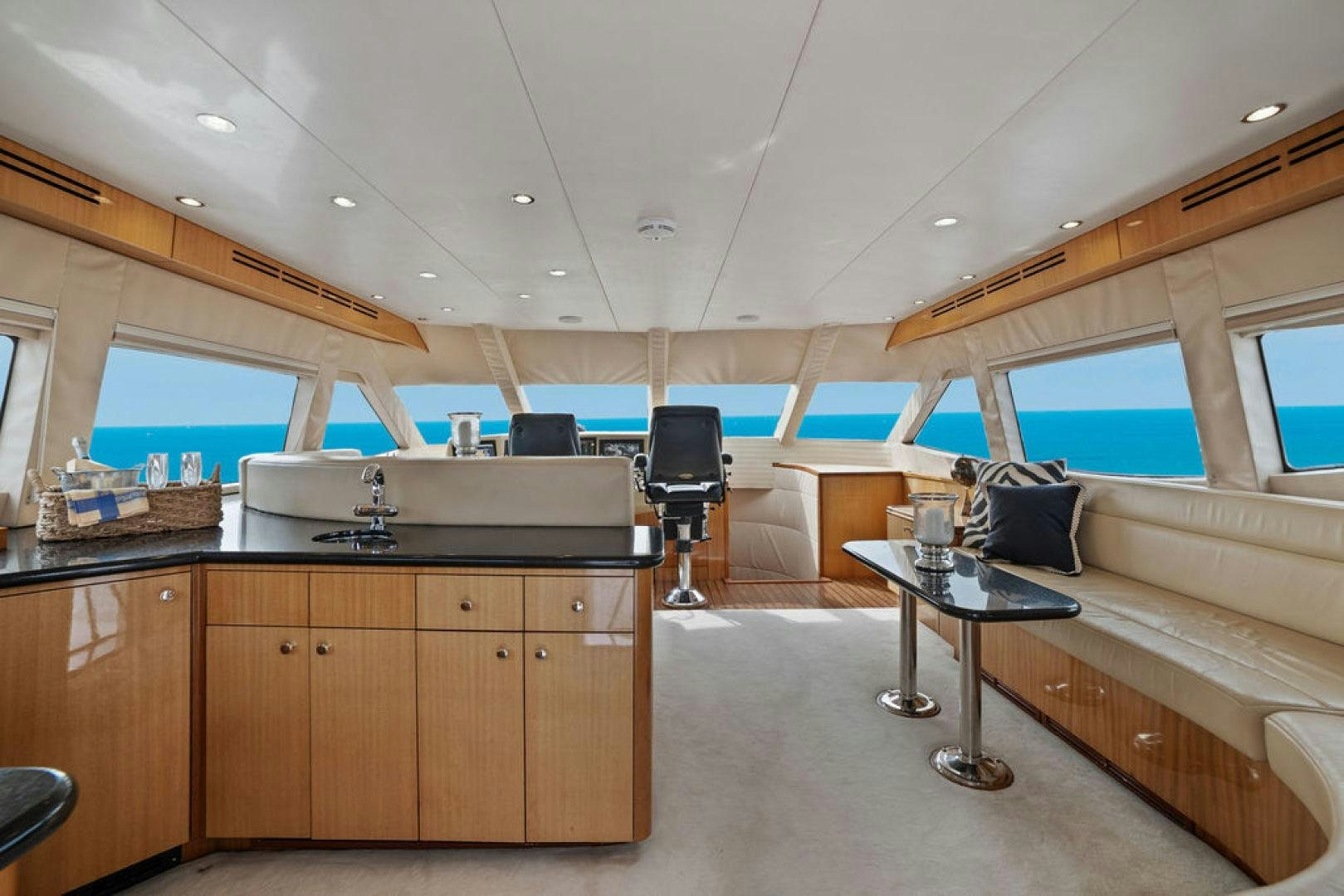 a large kitchen with a large window aboard LA MER Yacht for Sale