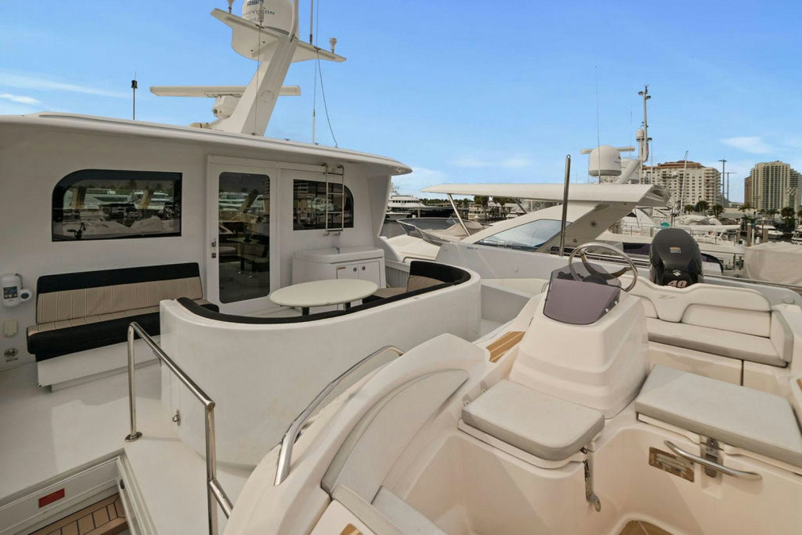 a boat with seats on it aboard LA MER Yacht for Sale