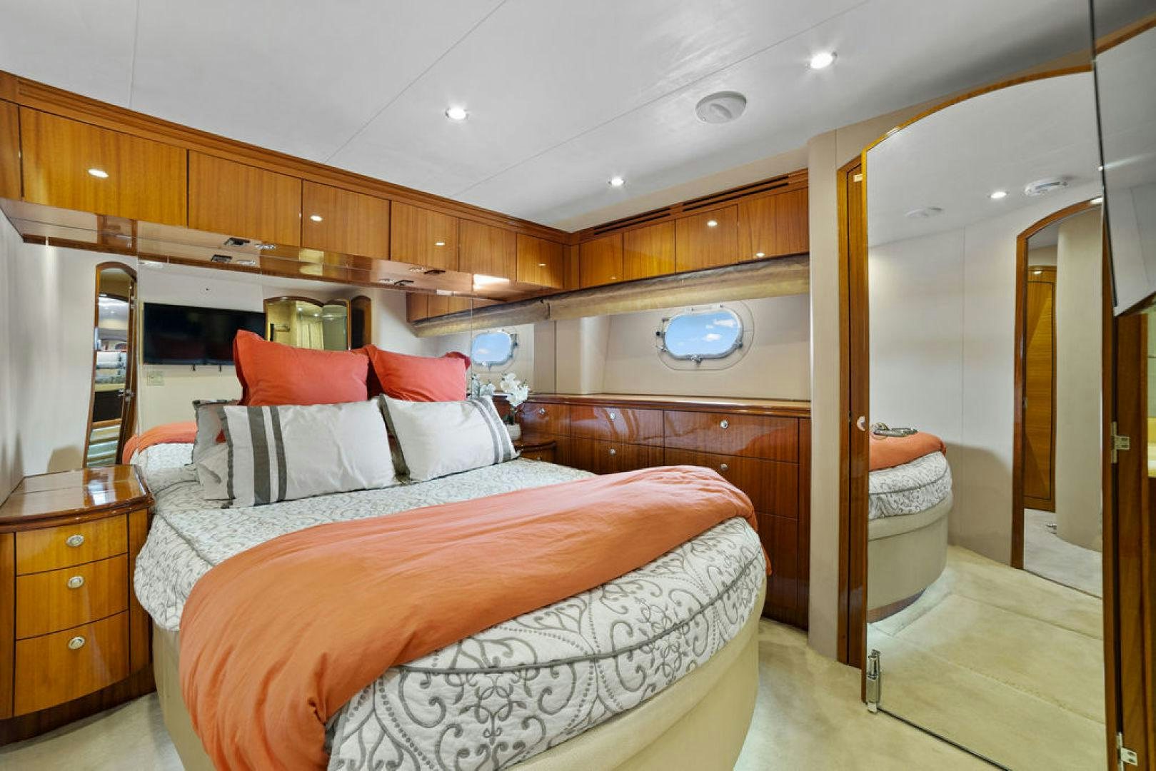 a large bedroom with a large bed aboard LA MER Yacht for Sale
