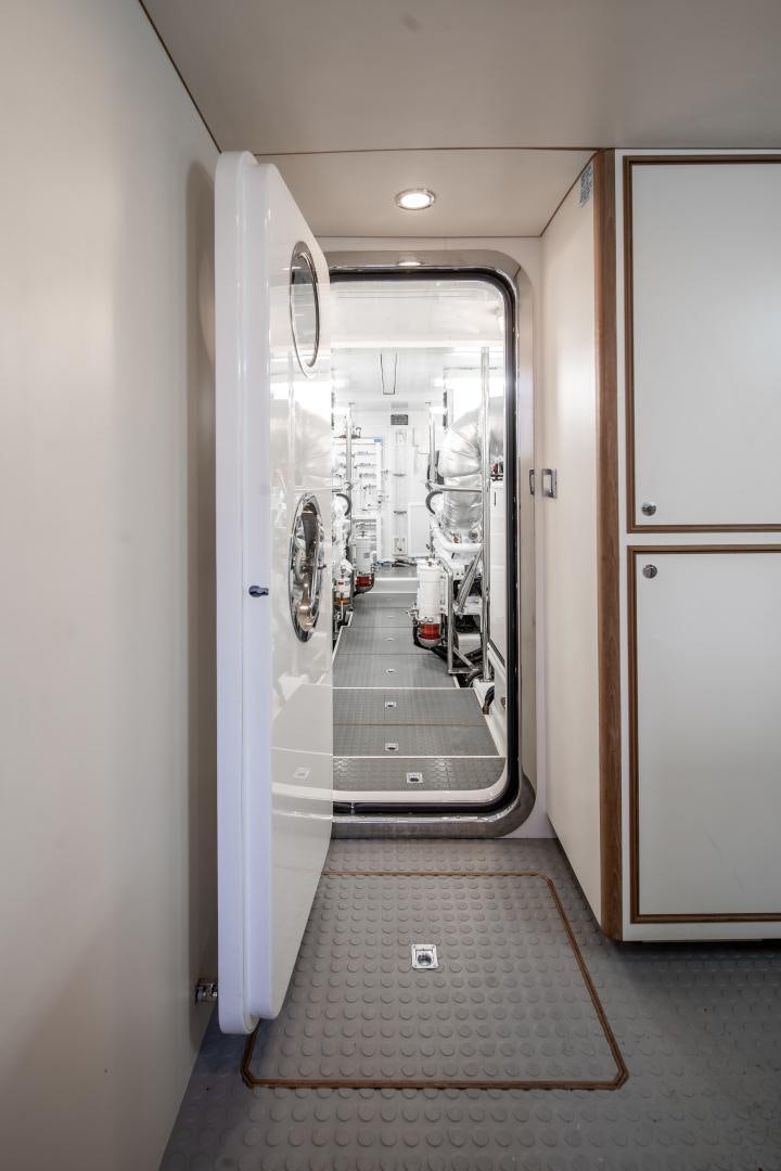 a hallway with doors aboard CAPTIVA Yacht for Sale