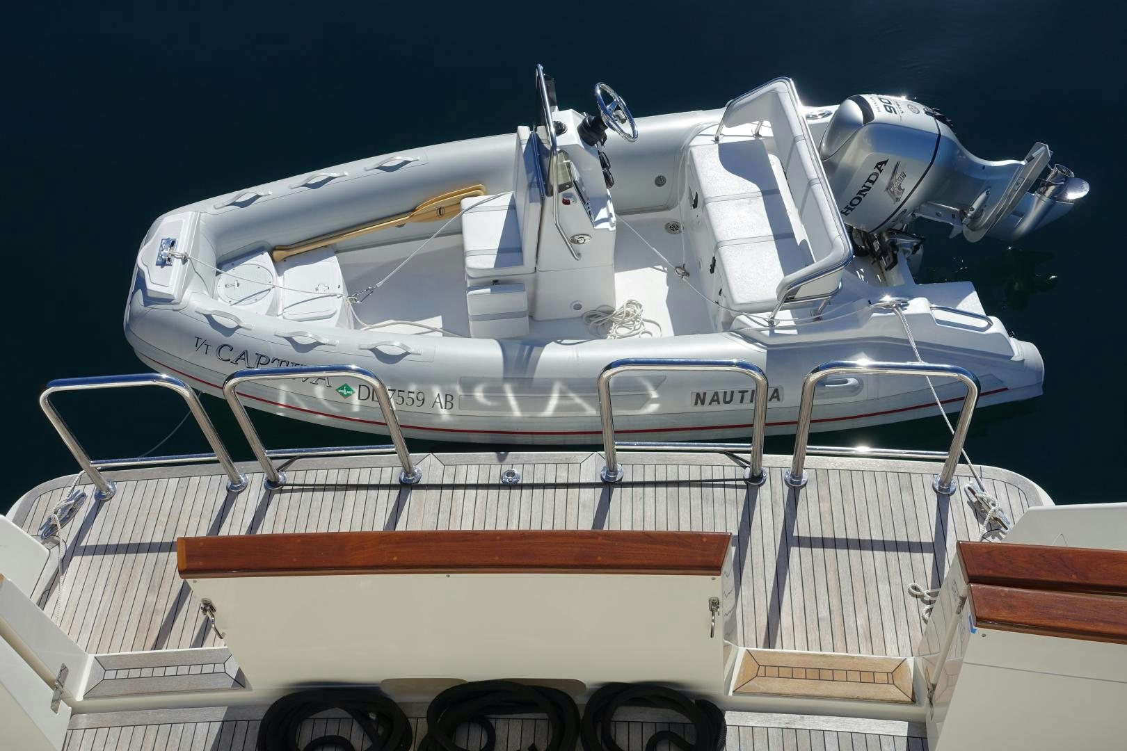 a white machine on a trailer aboard CAPTIVA Yacht for Sale