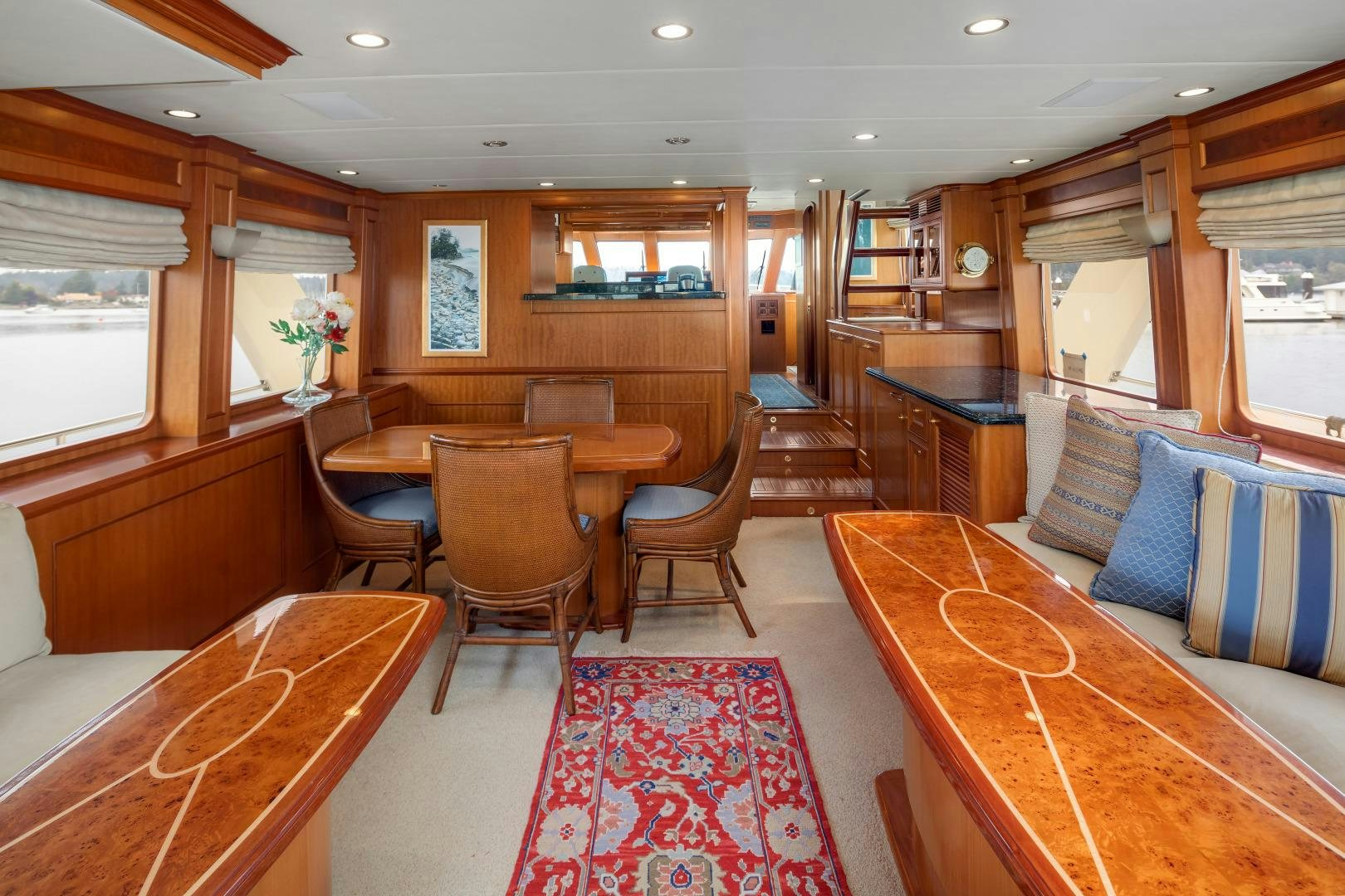 a living room with a couch and a table aboard CAPTIVA Yacht for Sale