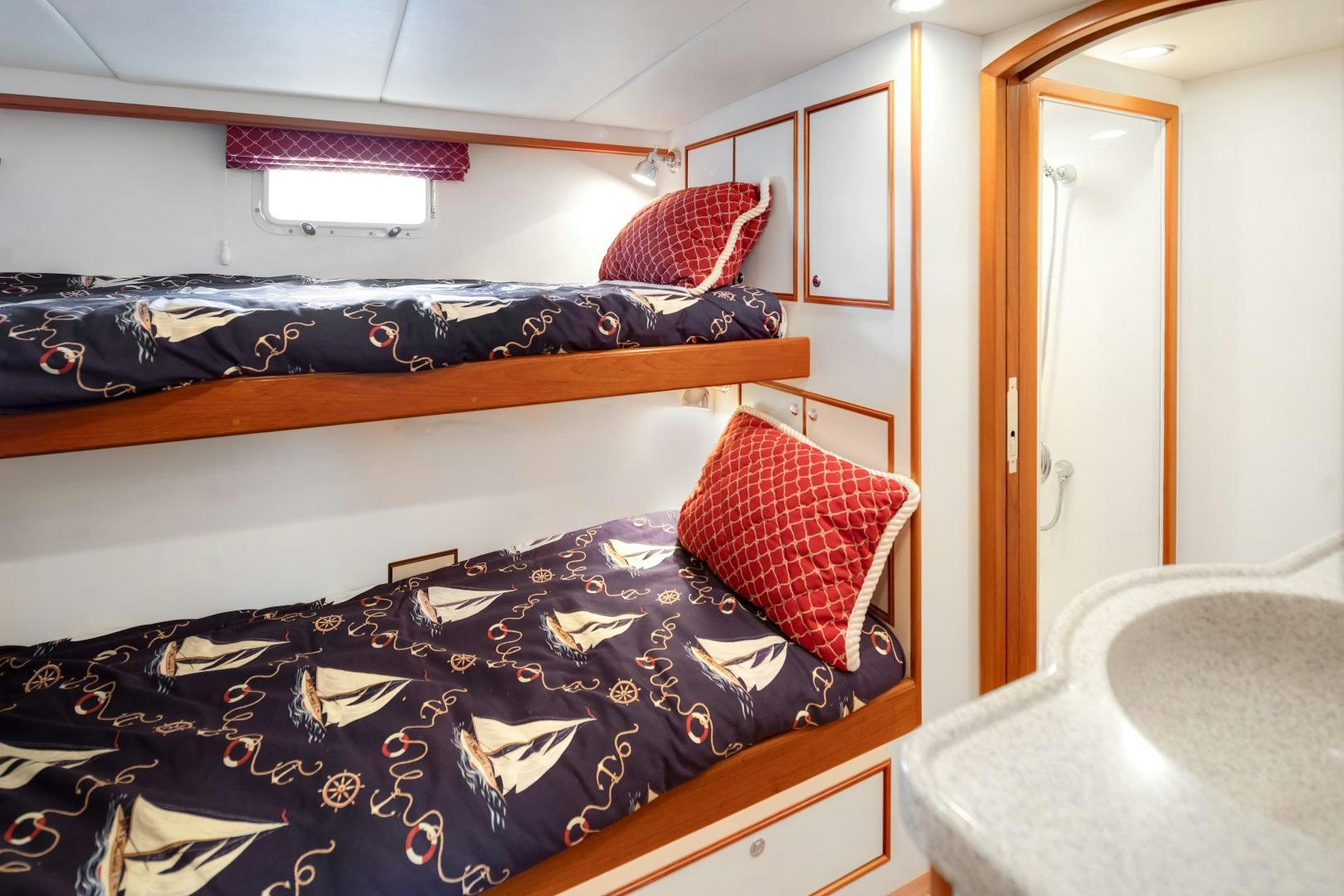 a room with two beds aboard CAPTIVA Yacht for Sale