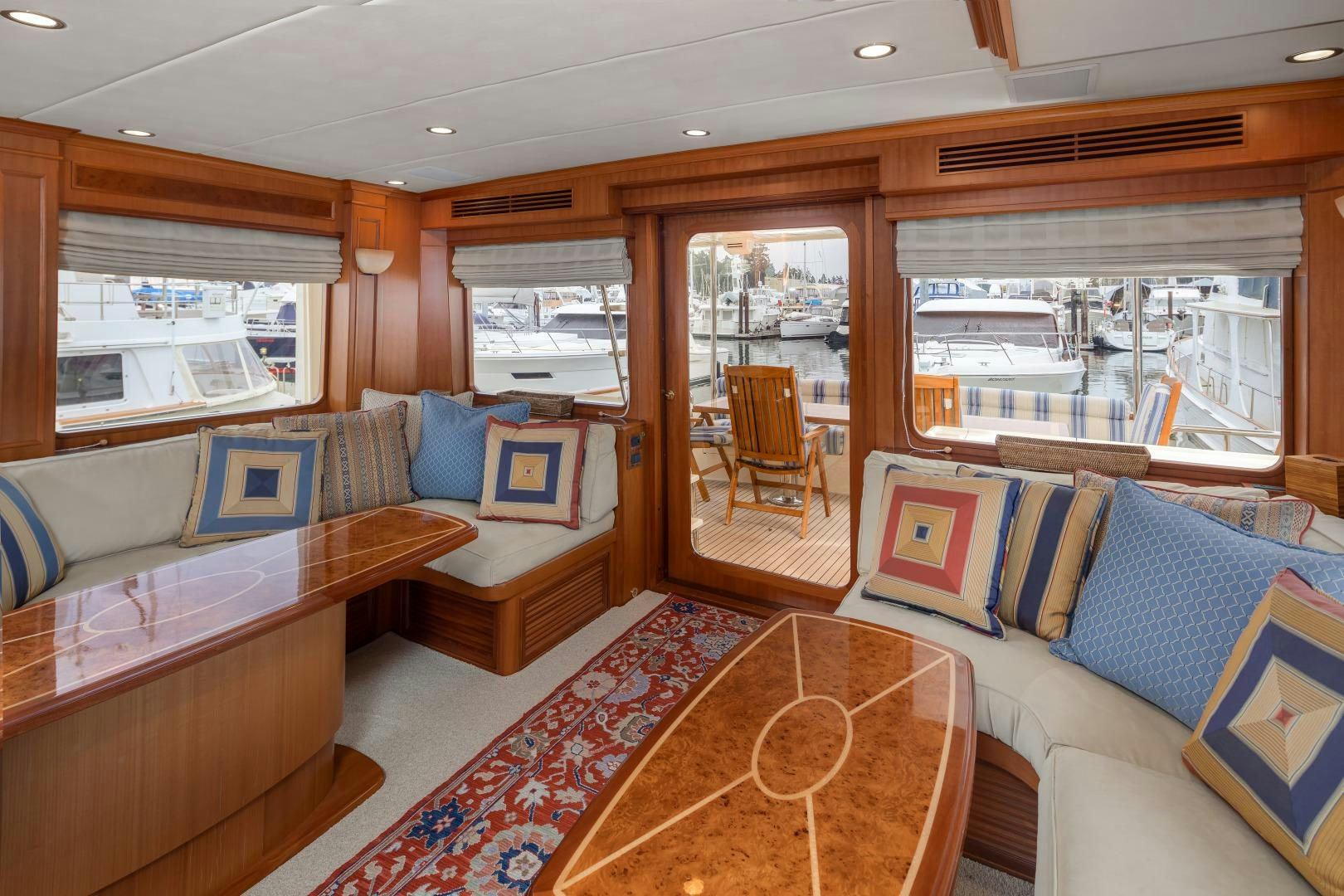 a living room with a couch and a table aboard CAPTIVA Yacht for Sale