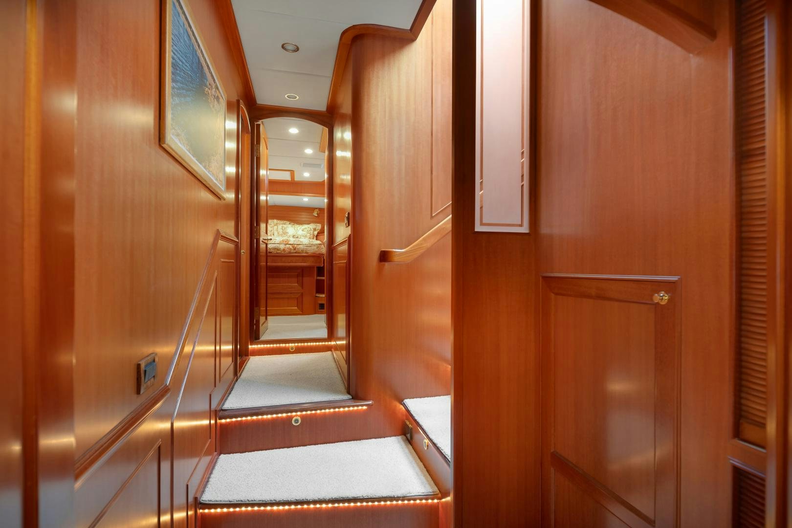 a room with wooden doors aboard CAPTIVA Yacht for Sale