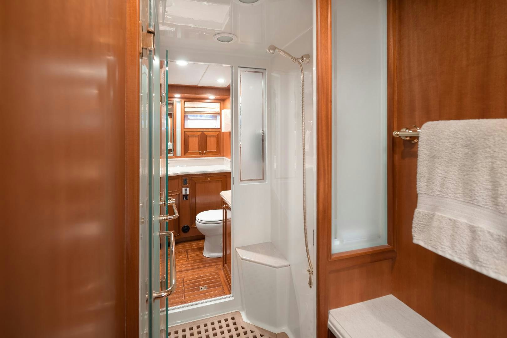 a bathroom with a shower and toilet aboard CAPTIVA Yacht for Sale
