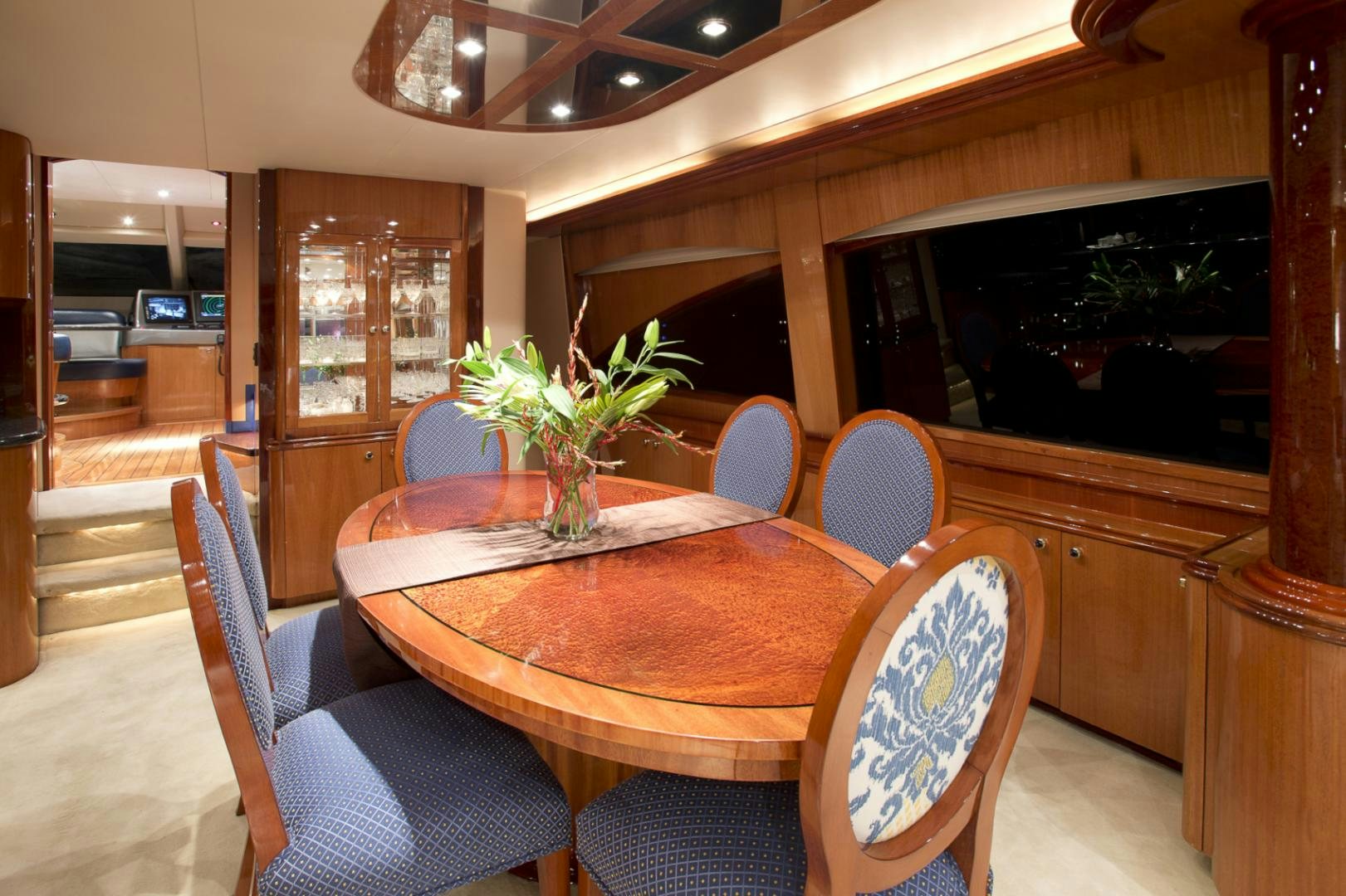 a dining table in a restaurant aboard ILLUMINIATION Yacht for Sale