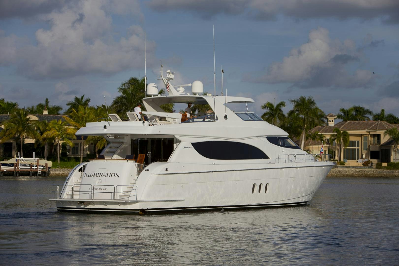 a white yacht on the water aboard ILLUMINIATION Yacht for Sale