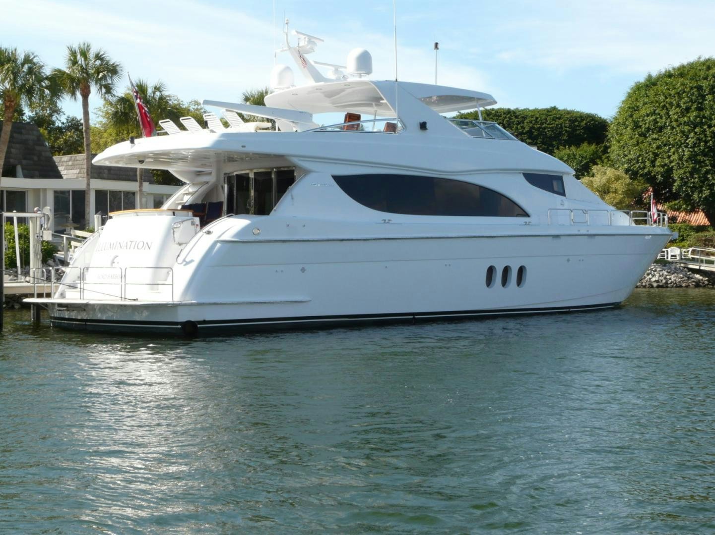 a white yacht on the water aboard ILLUMINIATION Yacht for Sale