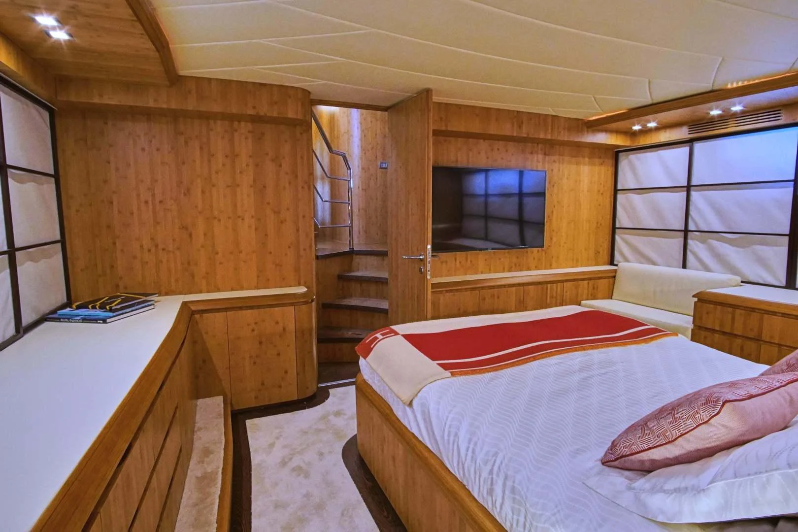a cabin with a bed aboard TAYYARAH Yacht for Sale