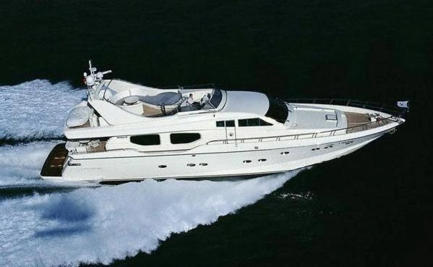 a white yacht on water aboard No Name Yacht for Sale