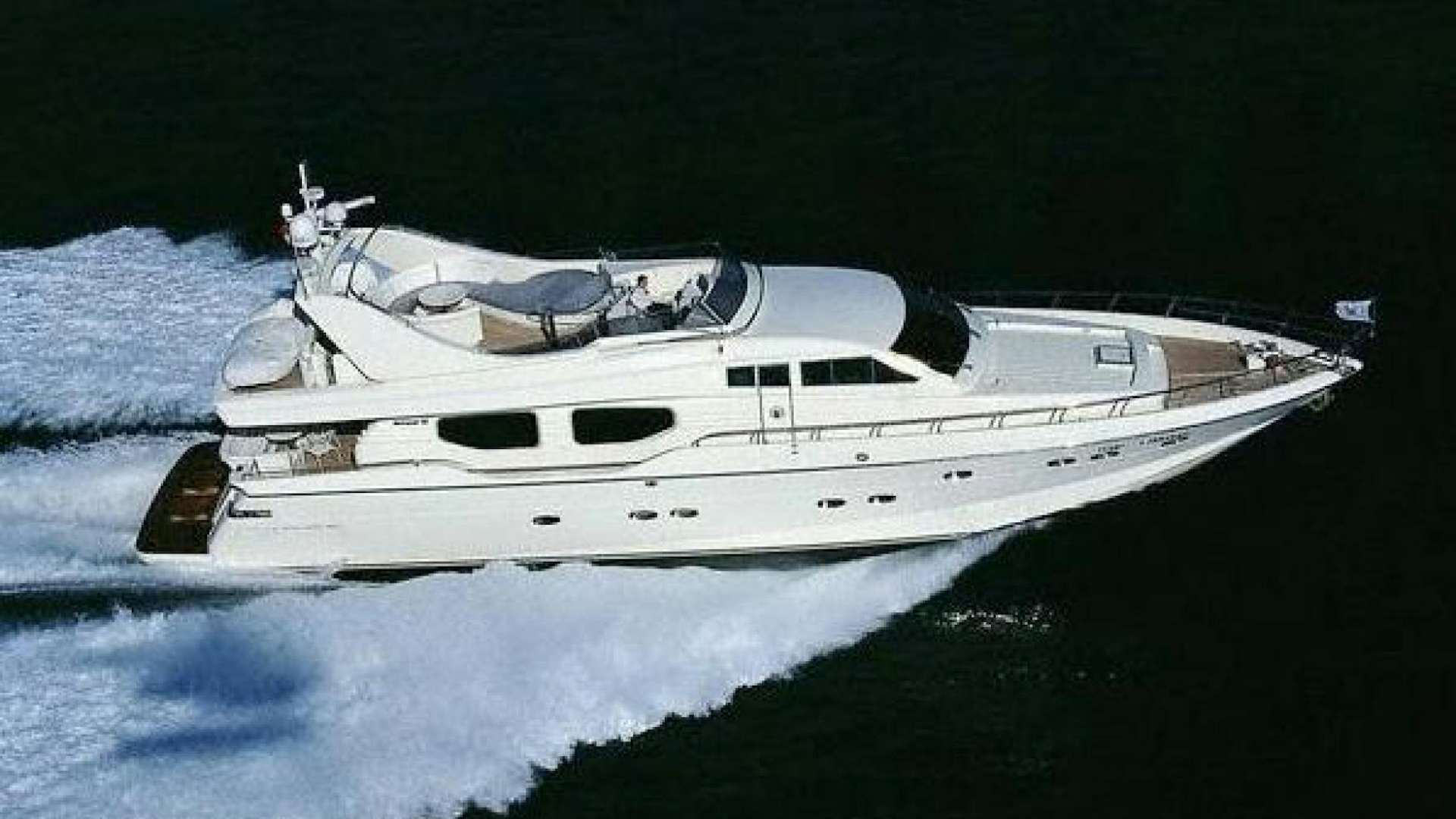 a white yacht on water aboard No Name Yacht for Sale