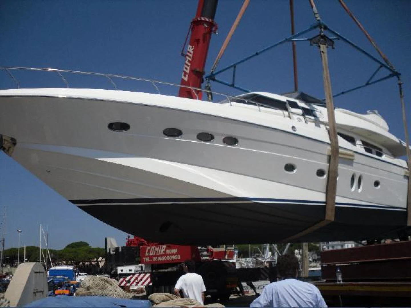a white yacht docked aboard No Name Yacht for Sale