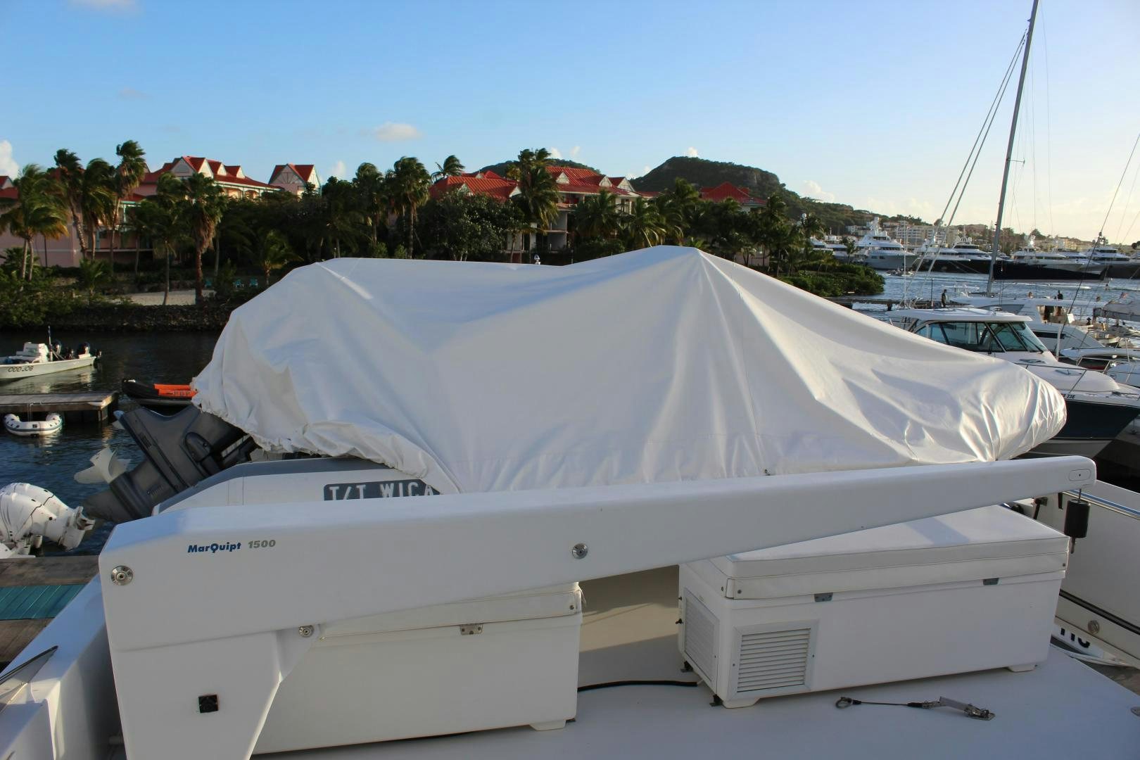 a boat with a white cover aboard No Name Yacht for Sale