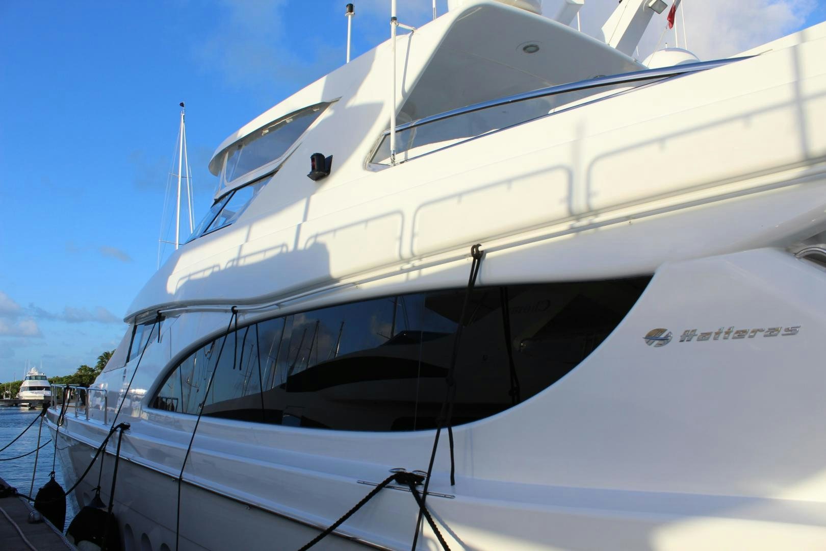 a white yacht in the water aboard No Name Yacht for Sale