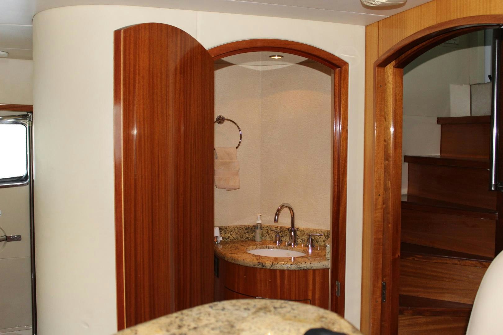 a bathroom with a sink and a mirror aboard No Name Yacht for Sale