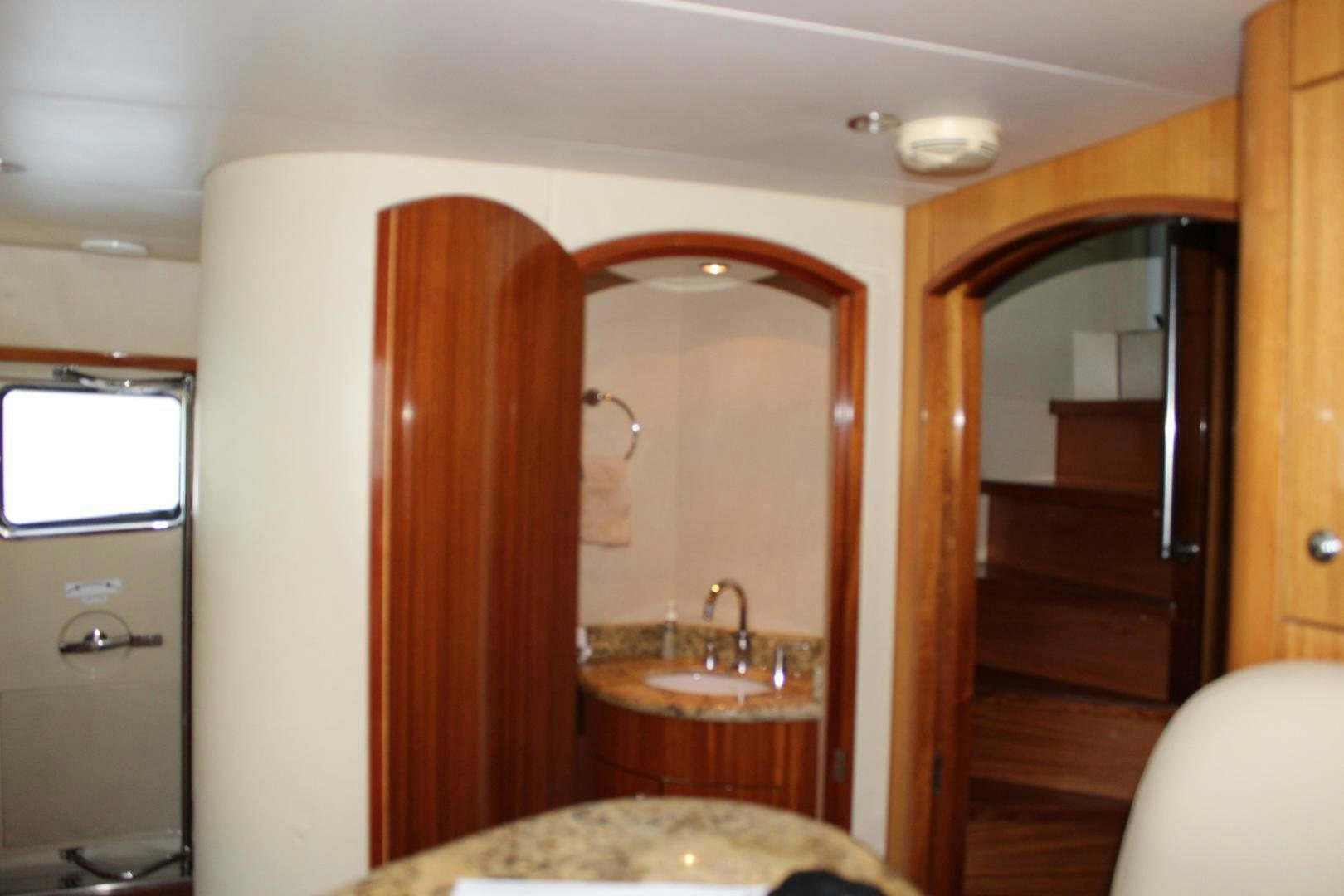 a bathroom with a sink and a mirror aboard No Name Yacht for Sale