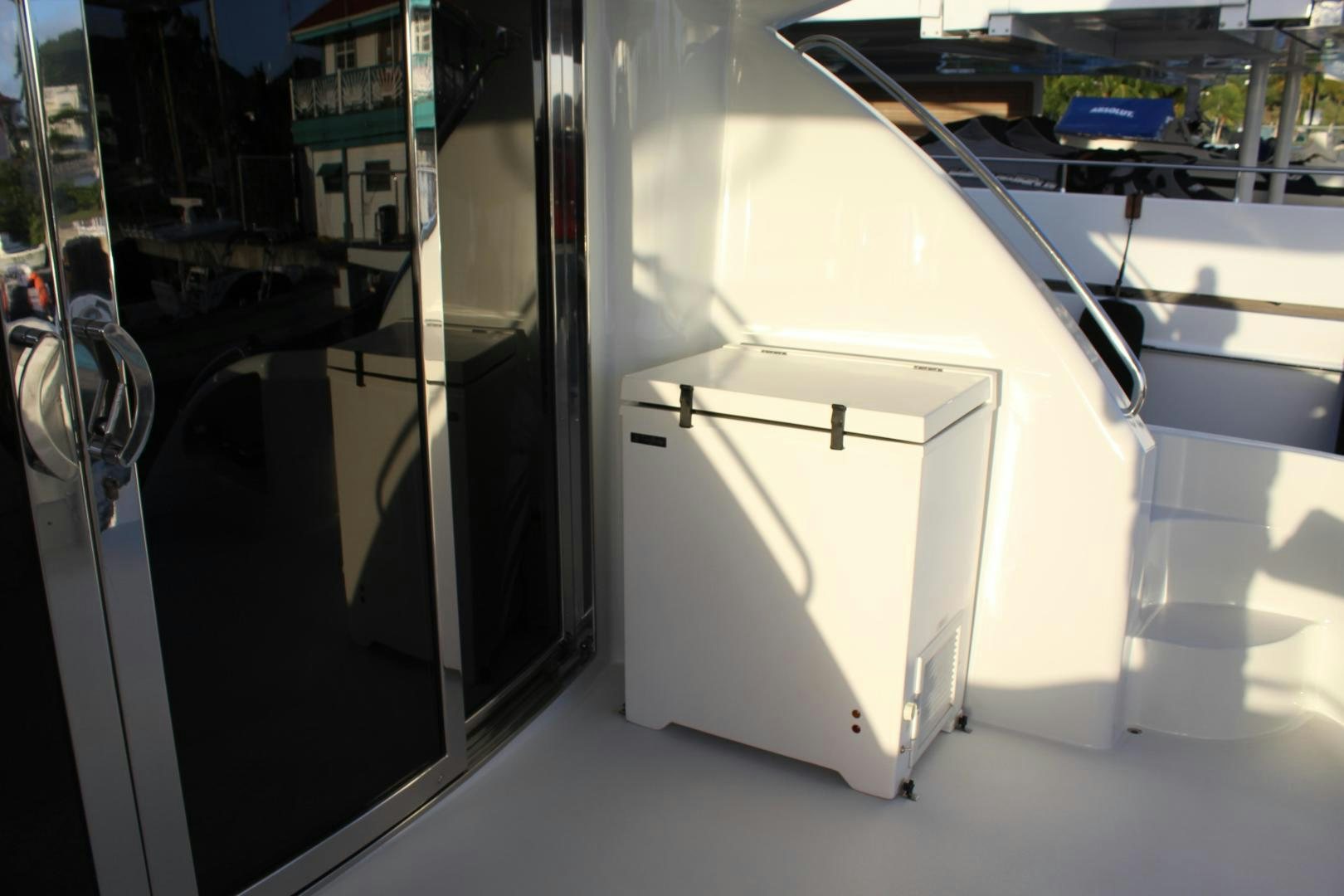 a white rectangular object with a black handle aboard No Name Yacht for Sale