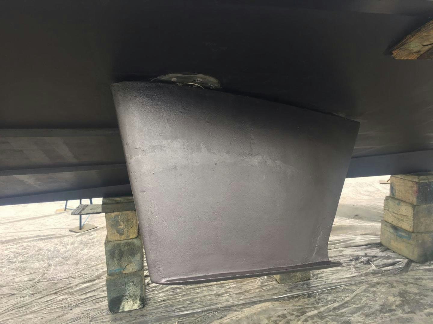 a metal cylinder on a wooden surface aboard No Name Yacht for Sale