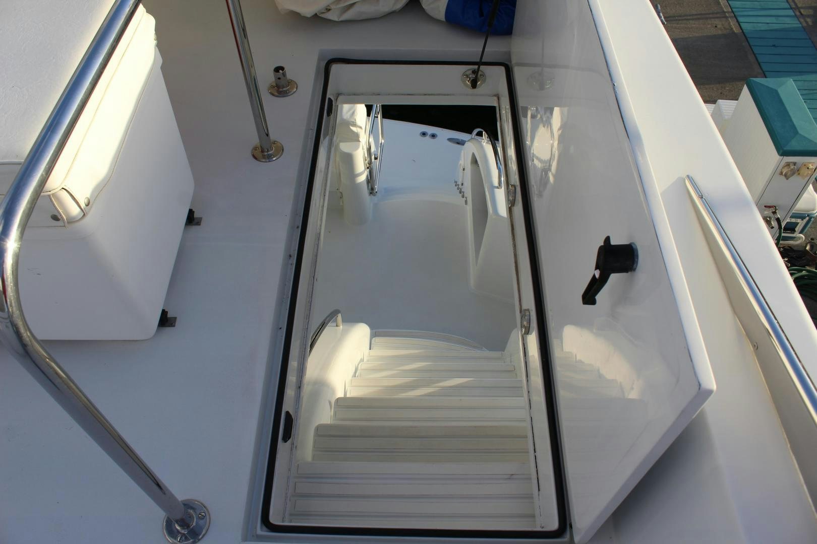 a white door with a handle aboard No Name Yacht for Sale
