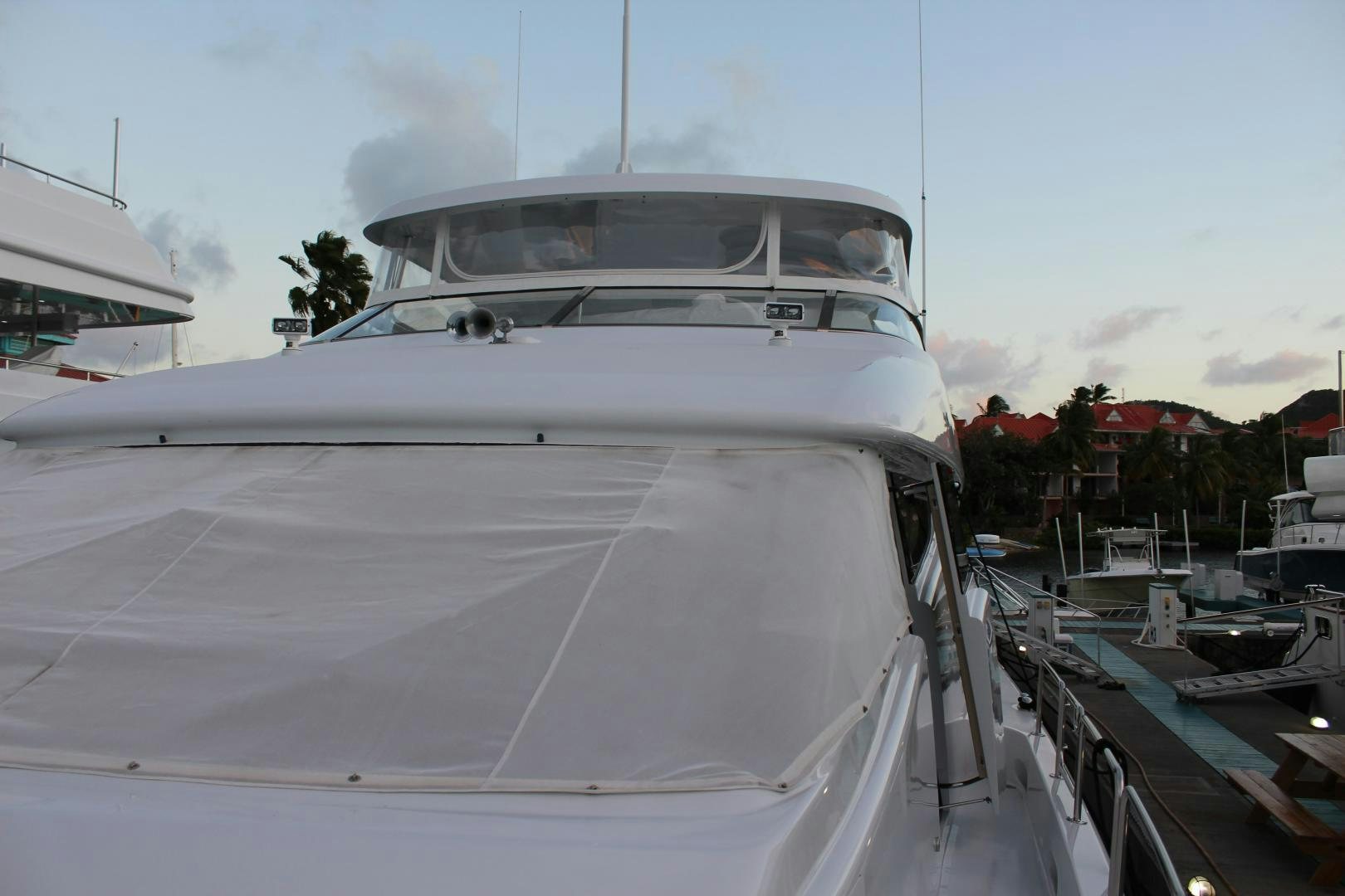 a white yacht docked aboard No Name Yacht for Sale