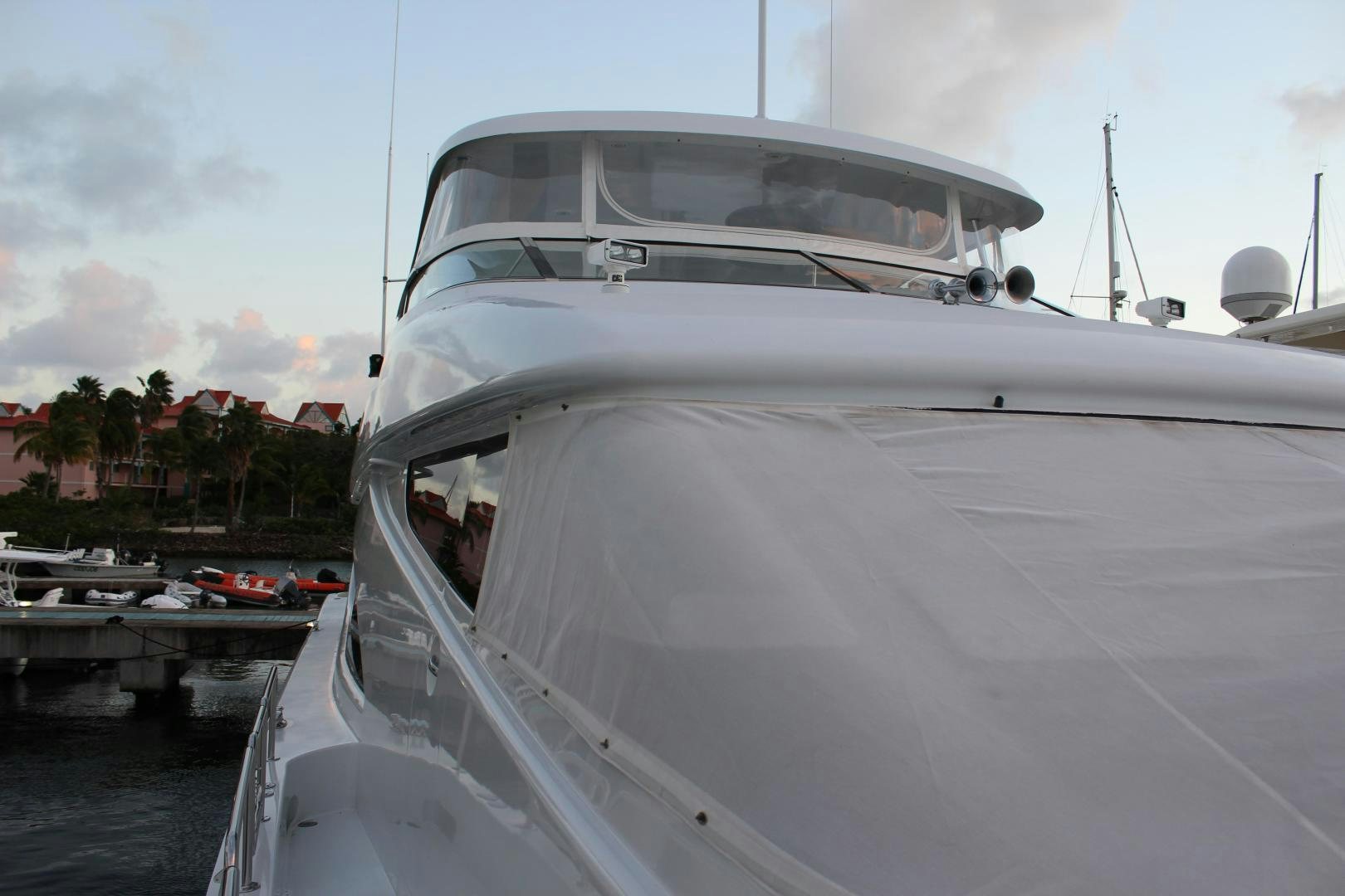 a white yacht docked aboard No Name Yacht for Sale