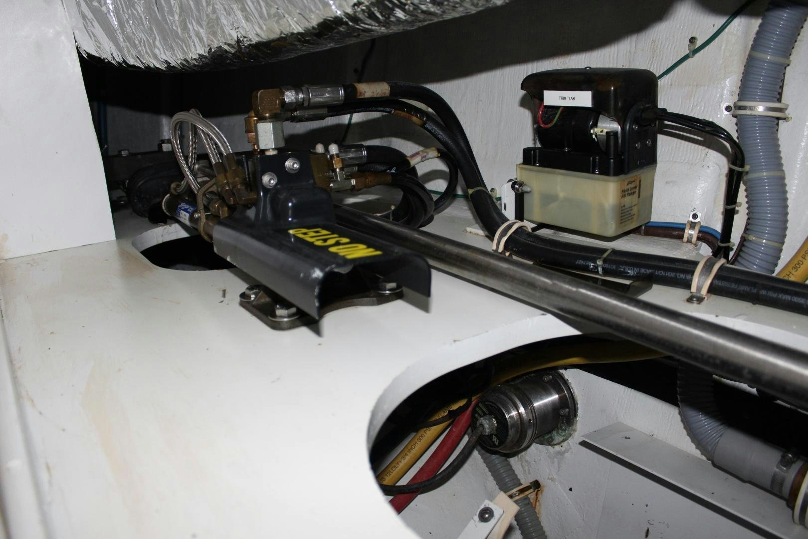 a car engine with a black hood aboard No Name Yacht for Sale