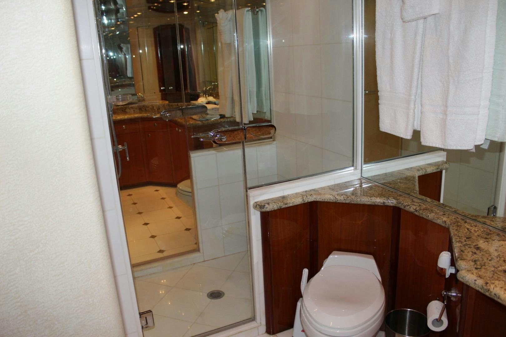 a bathroom with a toilet and a sink aboard No Name Yacht for Sale