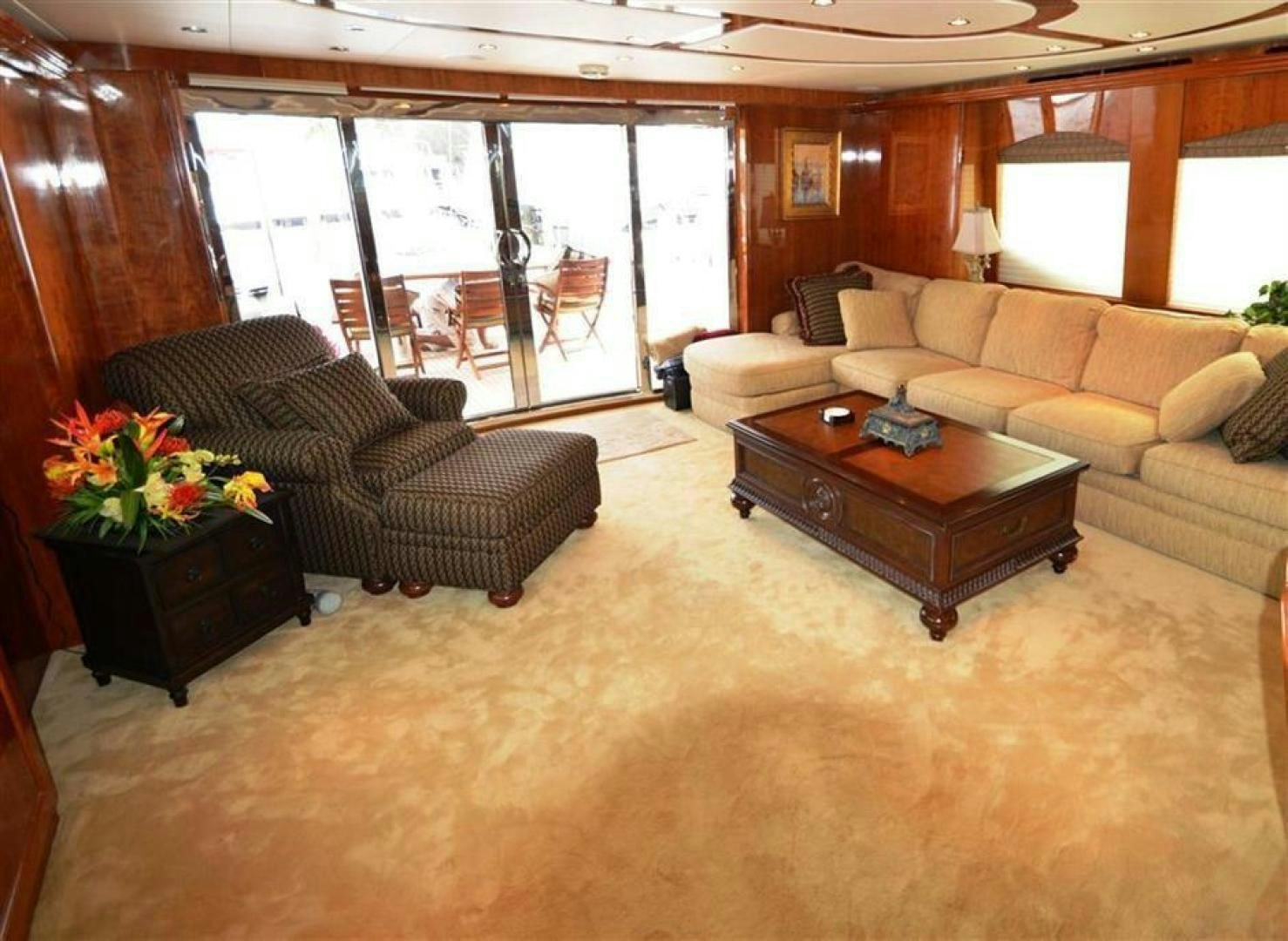 a living room with a large window aboard VICTORY Yacht for Sale