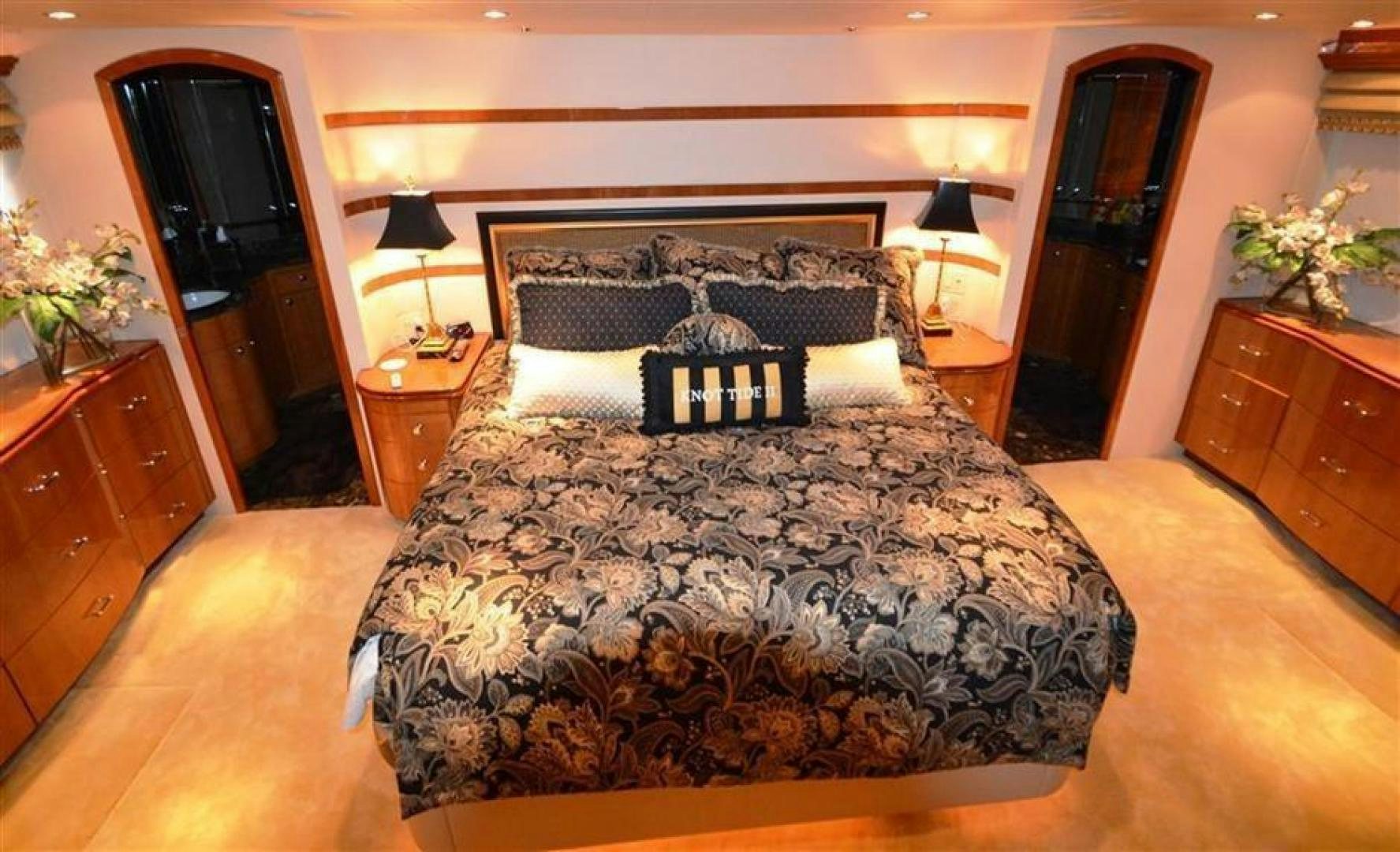 a large bed in a hotel room aboard VICTORY Yacht for Sale