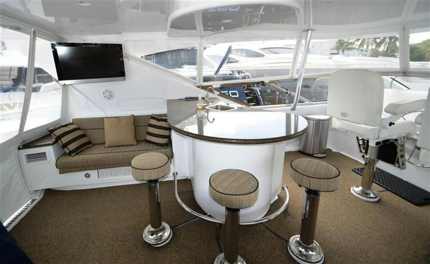 a room with a couch and a table and chairs aboard VICTORY Yacht for Sale