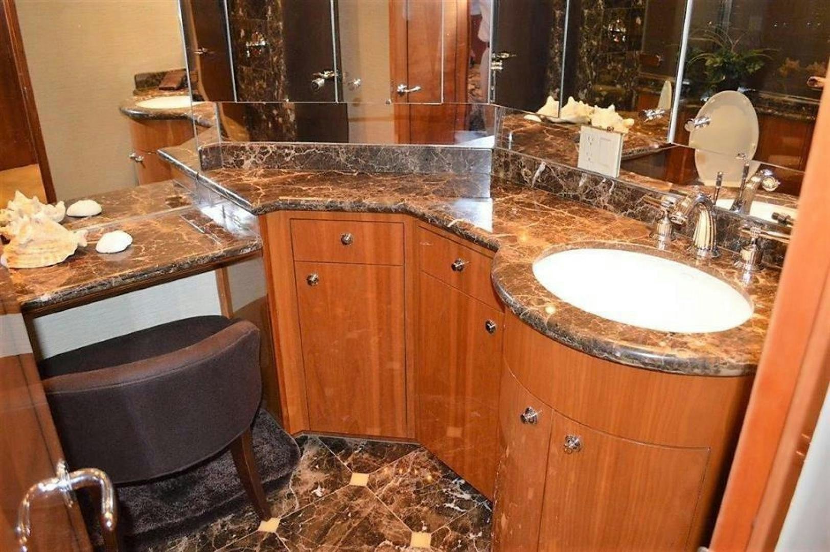 a bathroom with a sink and a mirror aboard VICTORY Yacht for Sale