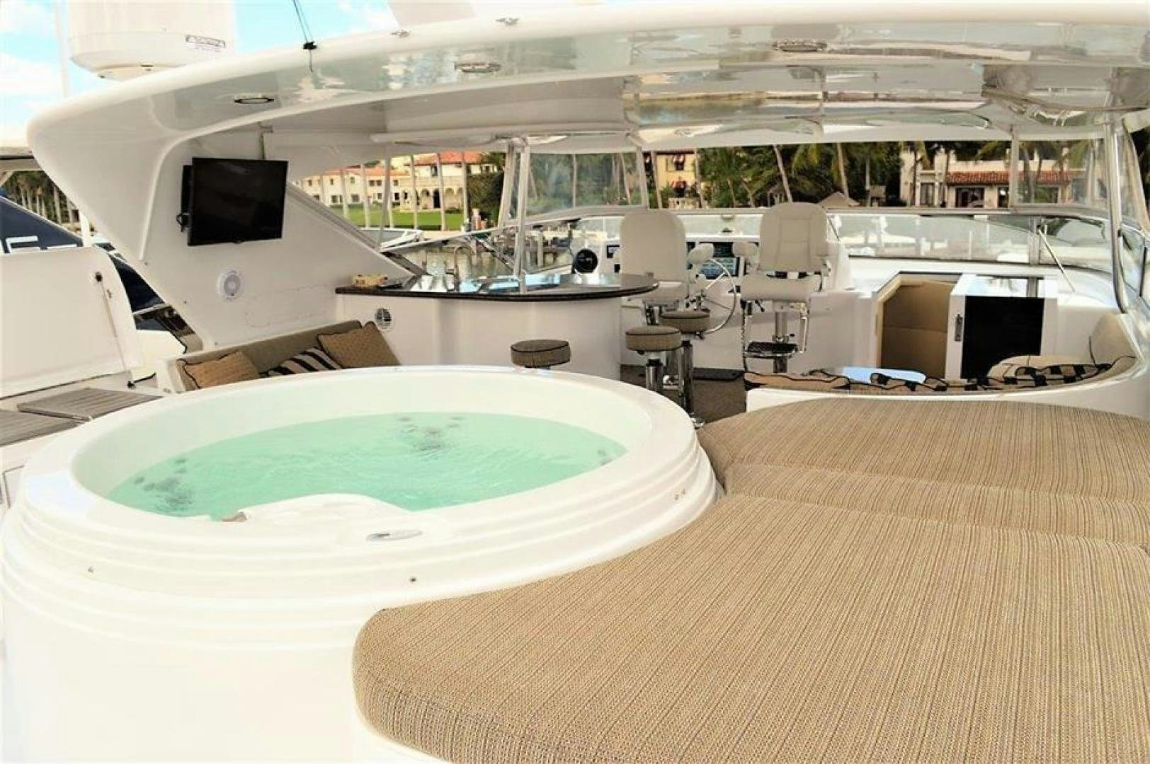 a room with a table and chairs aboard VICTORY Yacht for Sale