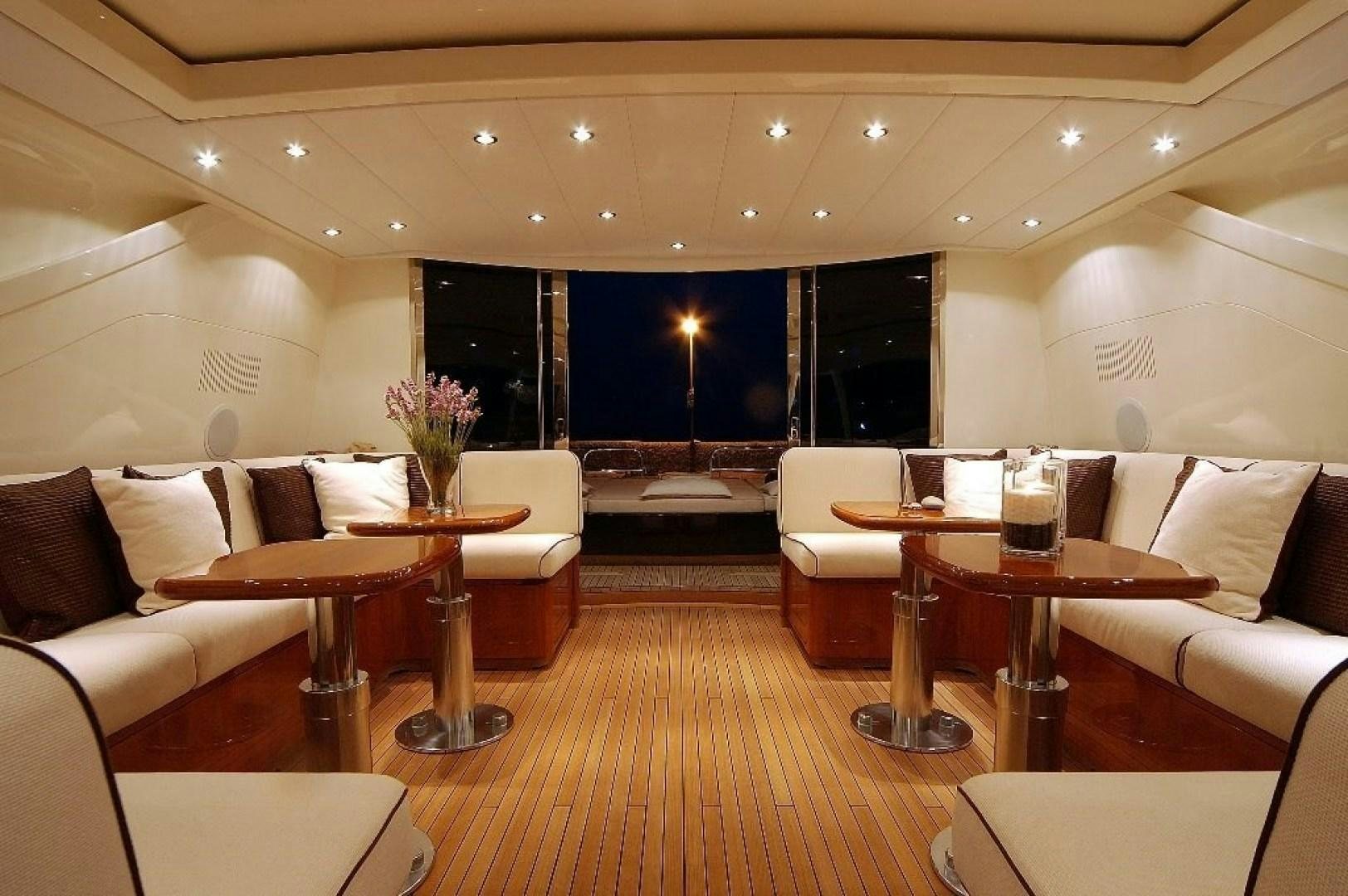 a living room with a large window aboard TOBEKA Yacht for Sale