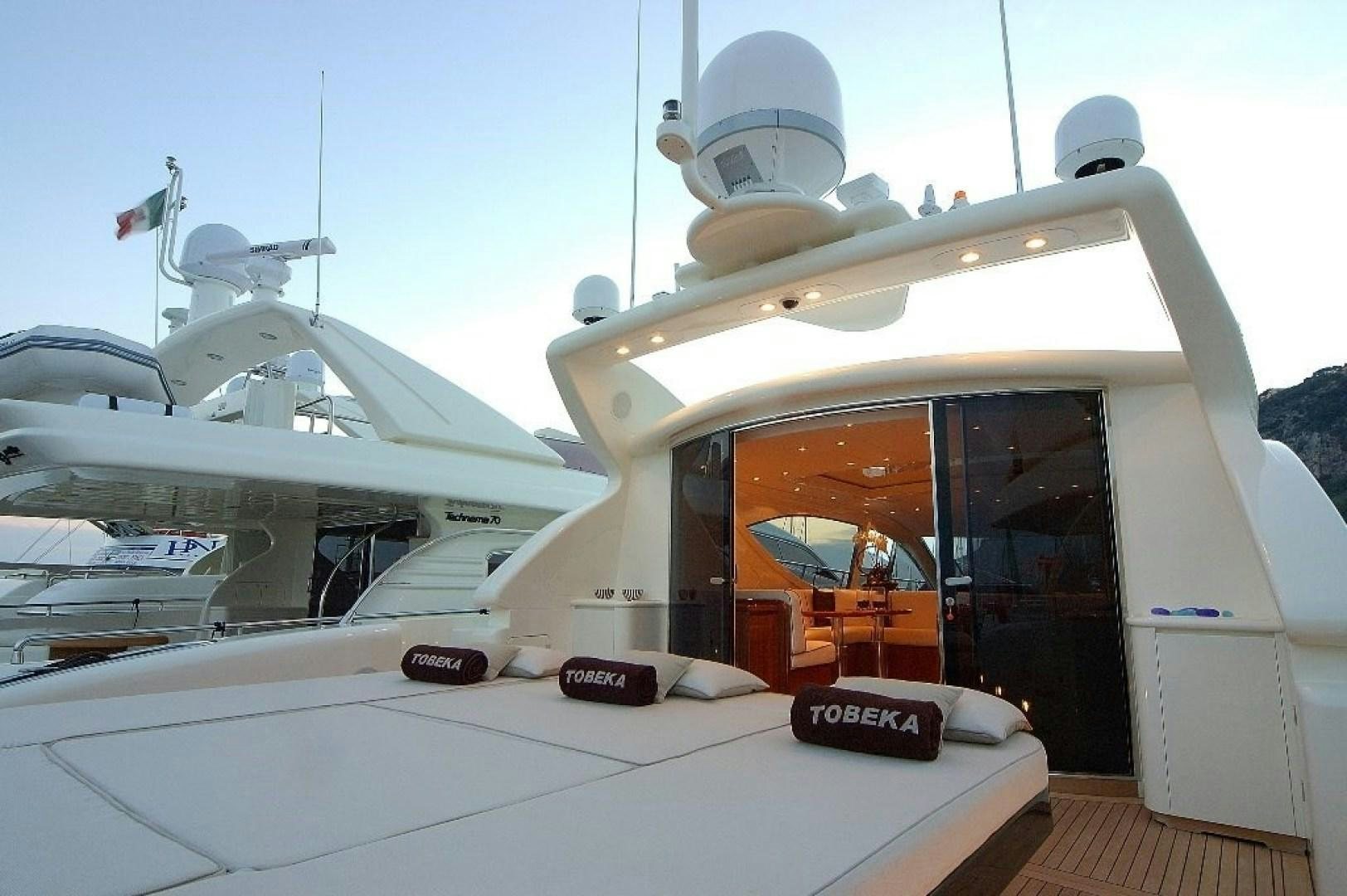 a boat with a large white boat aboard TOBEKA Yacht for Sale