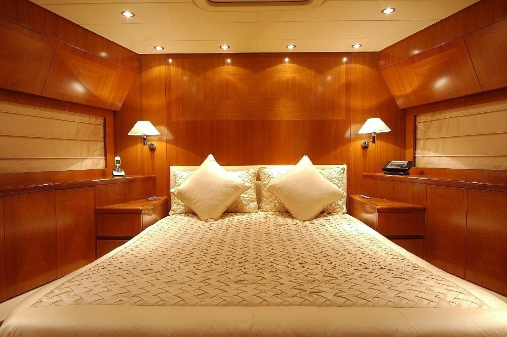 a bed with pillows aboard TOBEKA Yacht for Sale