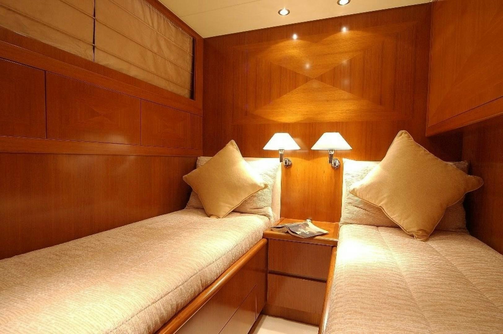 a room with two beds aboard TOBEKA Yacht for Sale