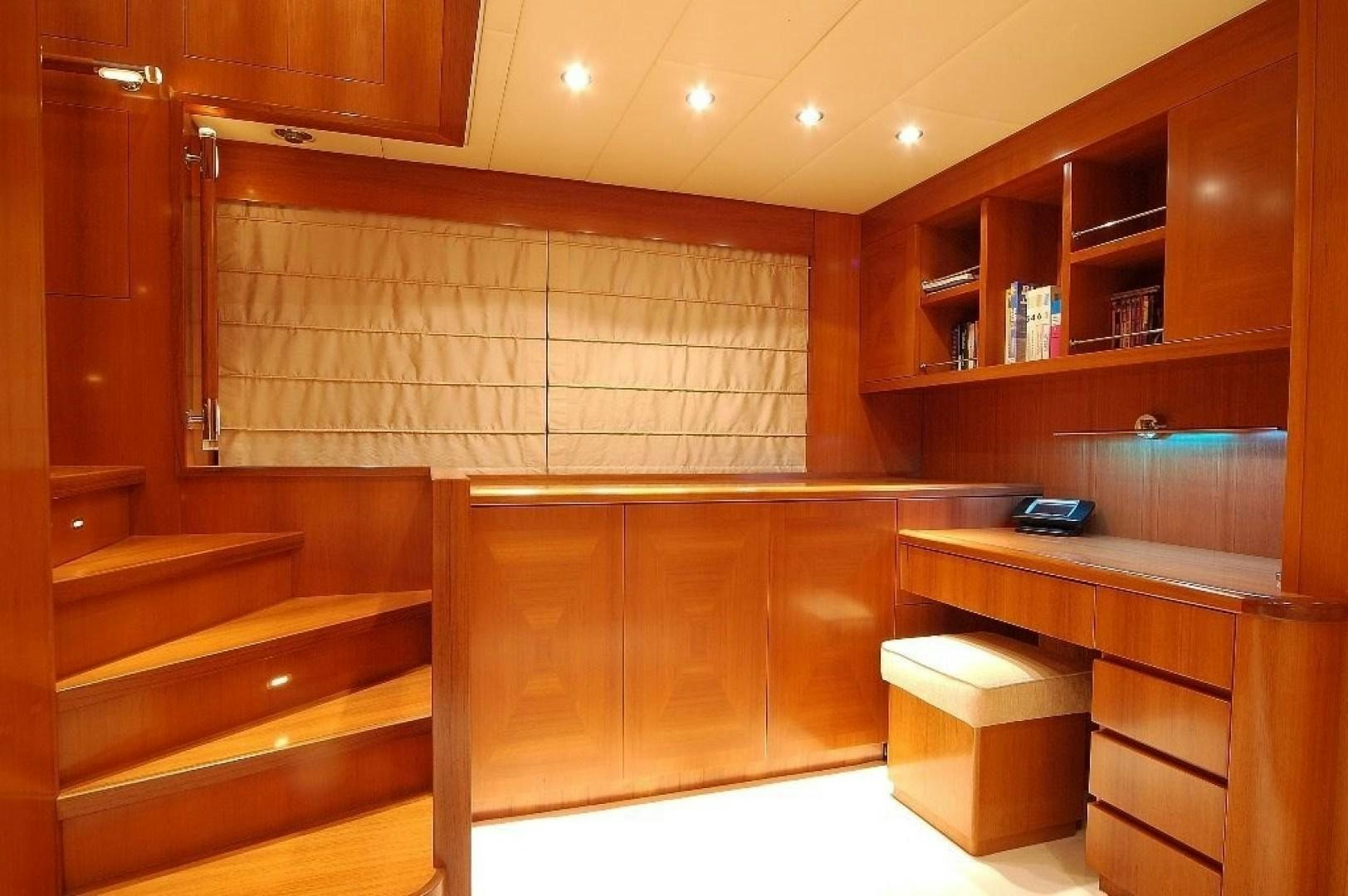 a room with wooden cabinets aboard TOBEKA Yacht for Sale