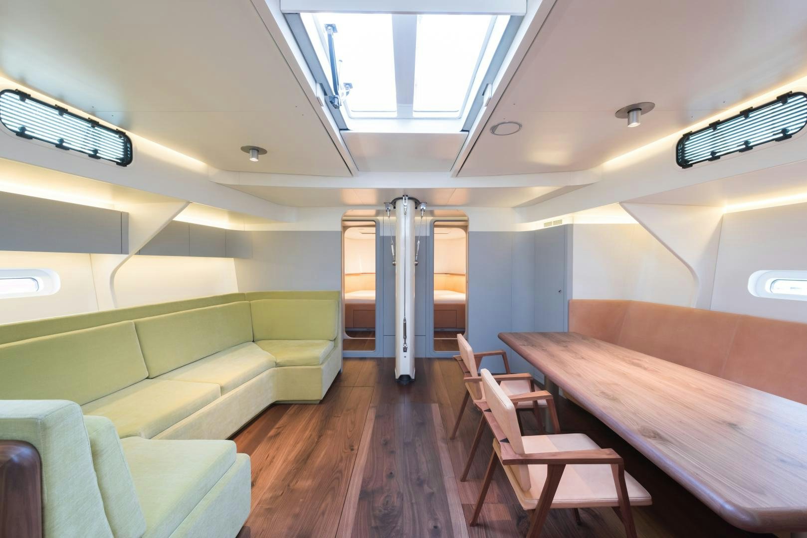 a room with tables and chairs aboard cool breeze Yacht for Sale