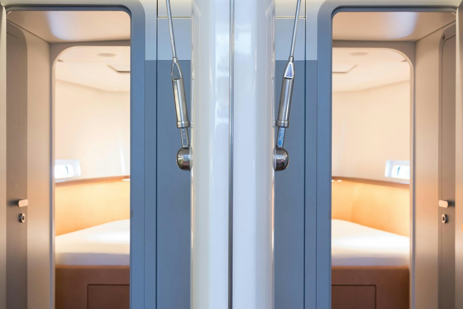 a bathroom with a blue door aboard cool breeze Yacht for Sale