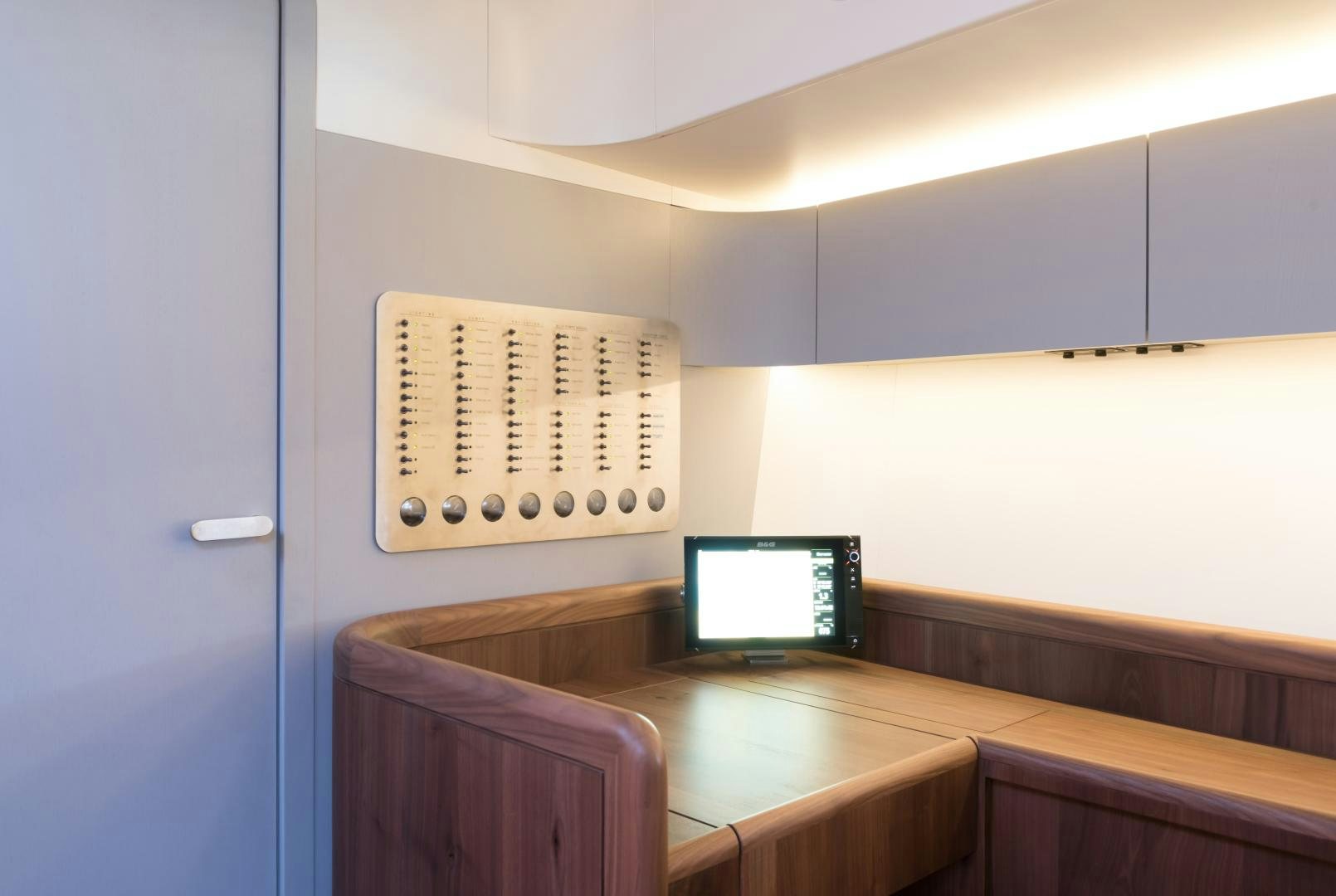 a computer on a desk aboard cool breeze Yacht for Sale