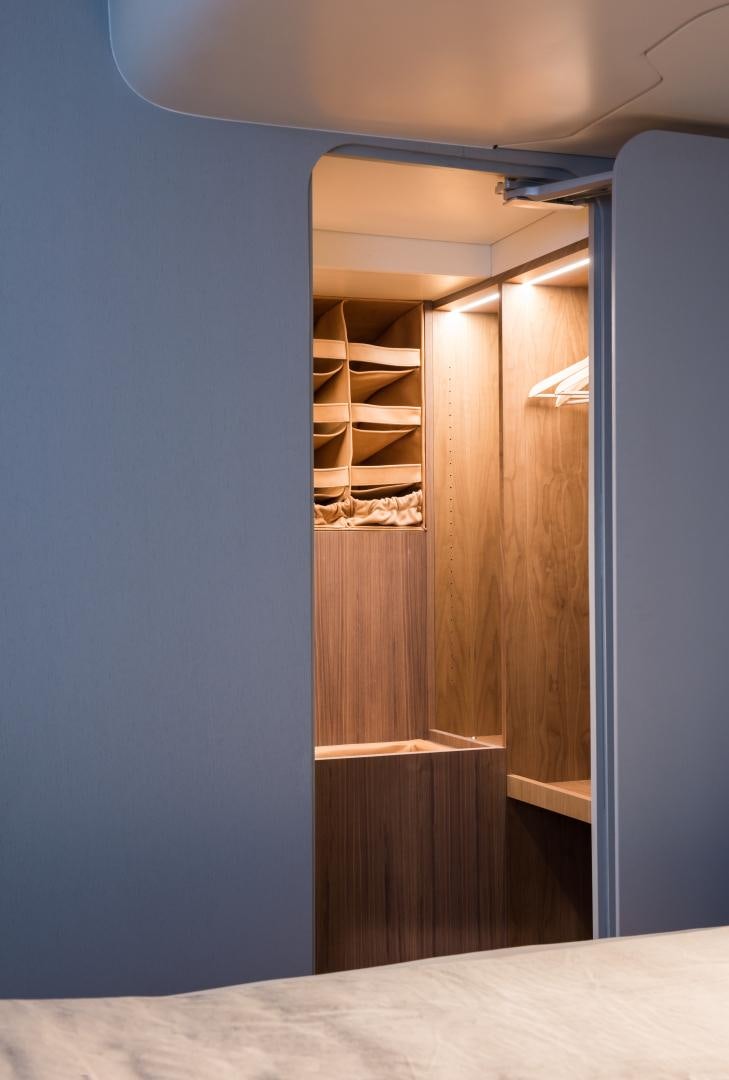 a wooden cabinet in a room aboard cool breeze Yacht for Sale