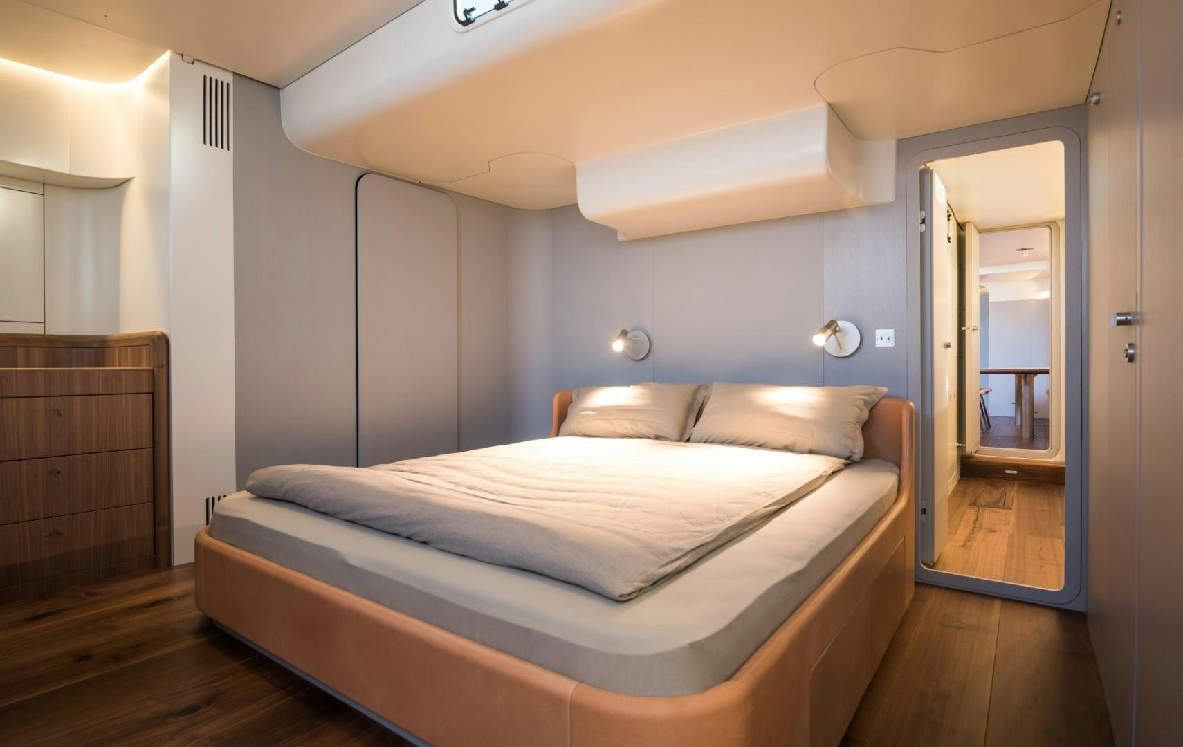 a bed in a room aboard cool breeze Yacht for Sale