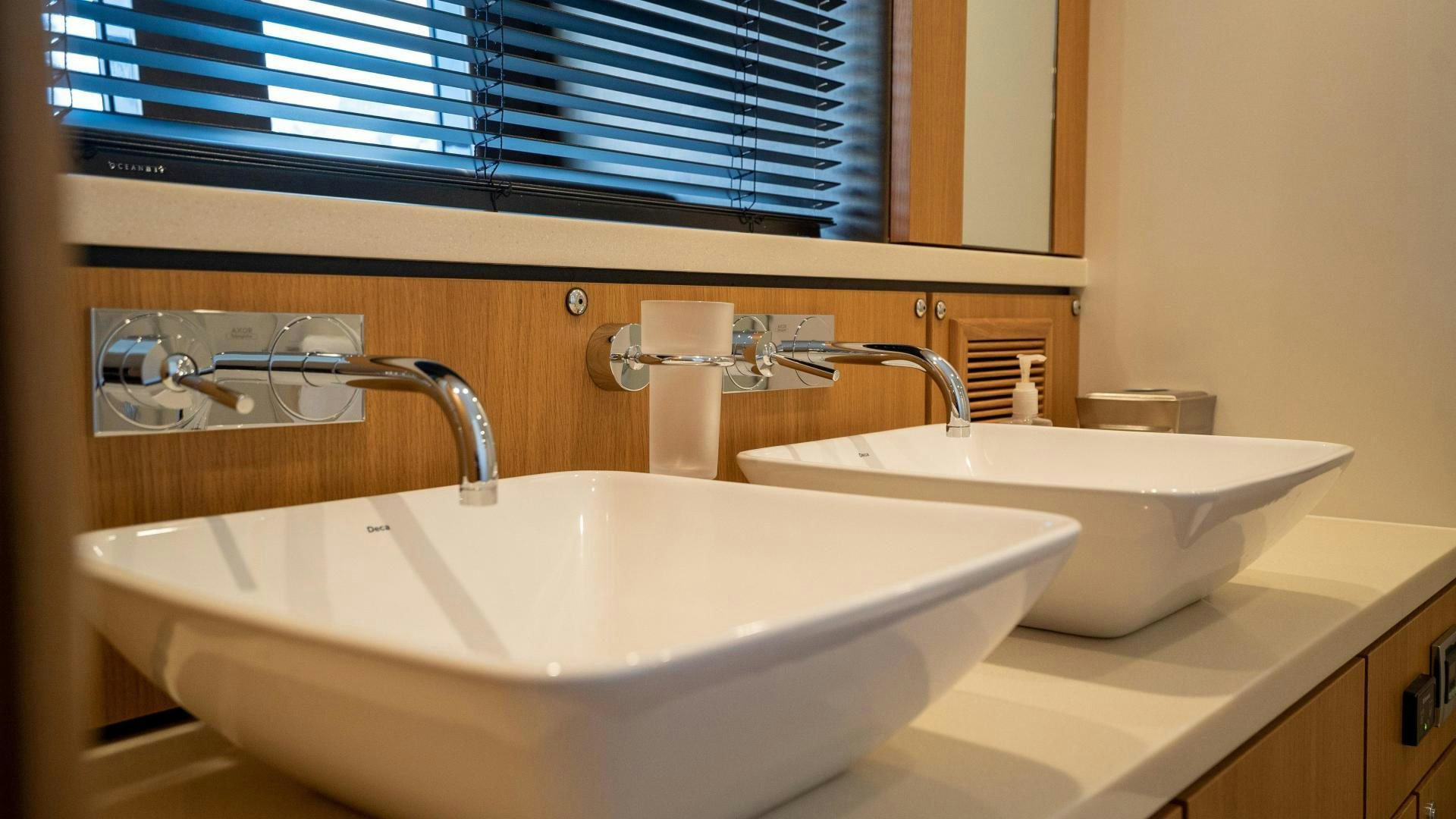 a couple of sinks in a bathroom aboard OCHO UNO Yacht for Sale