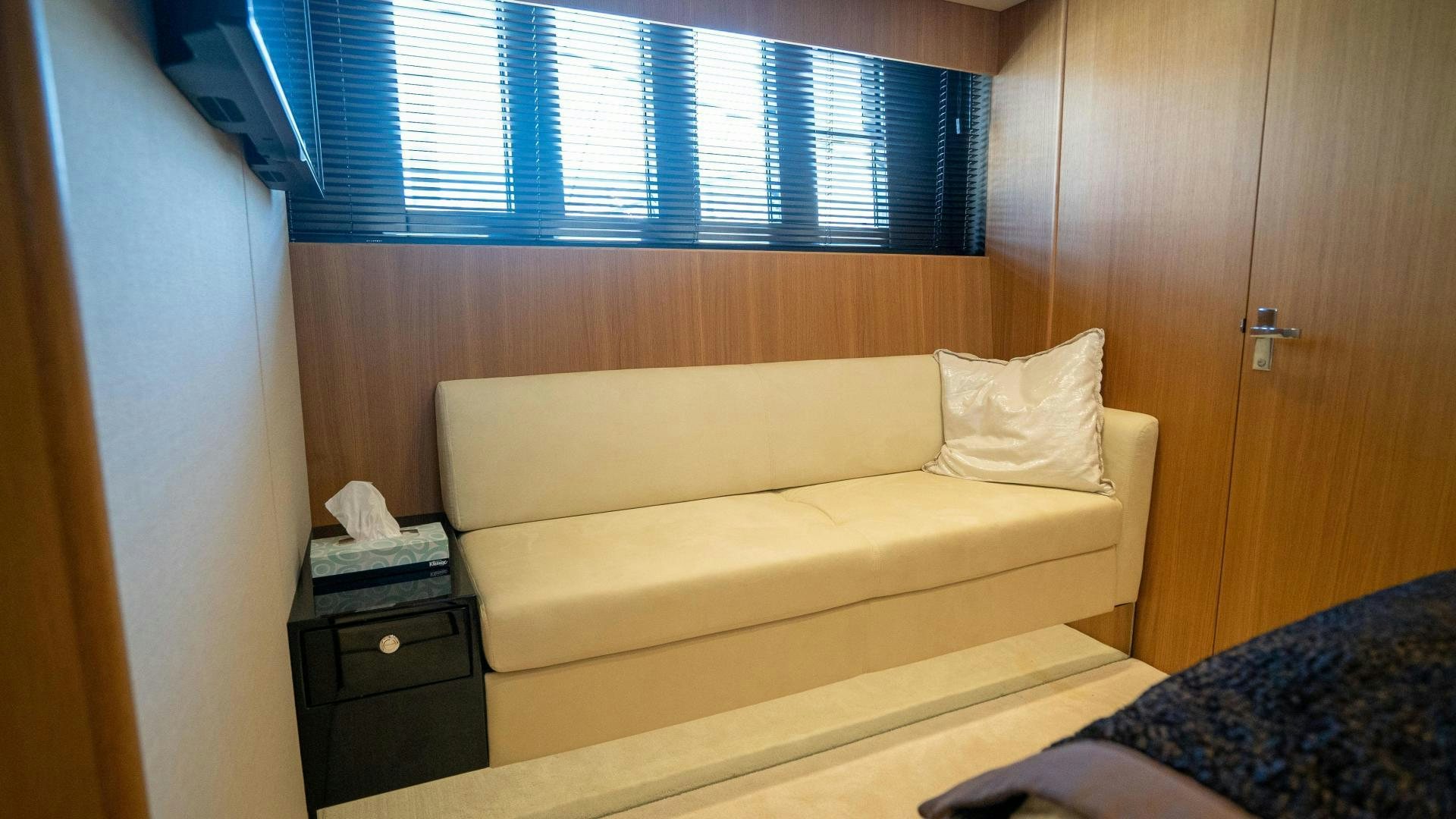 a bed in a room aboard OCHO UNO Yacht for Sale