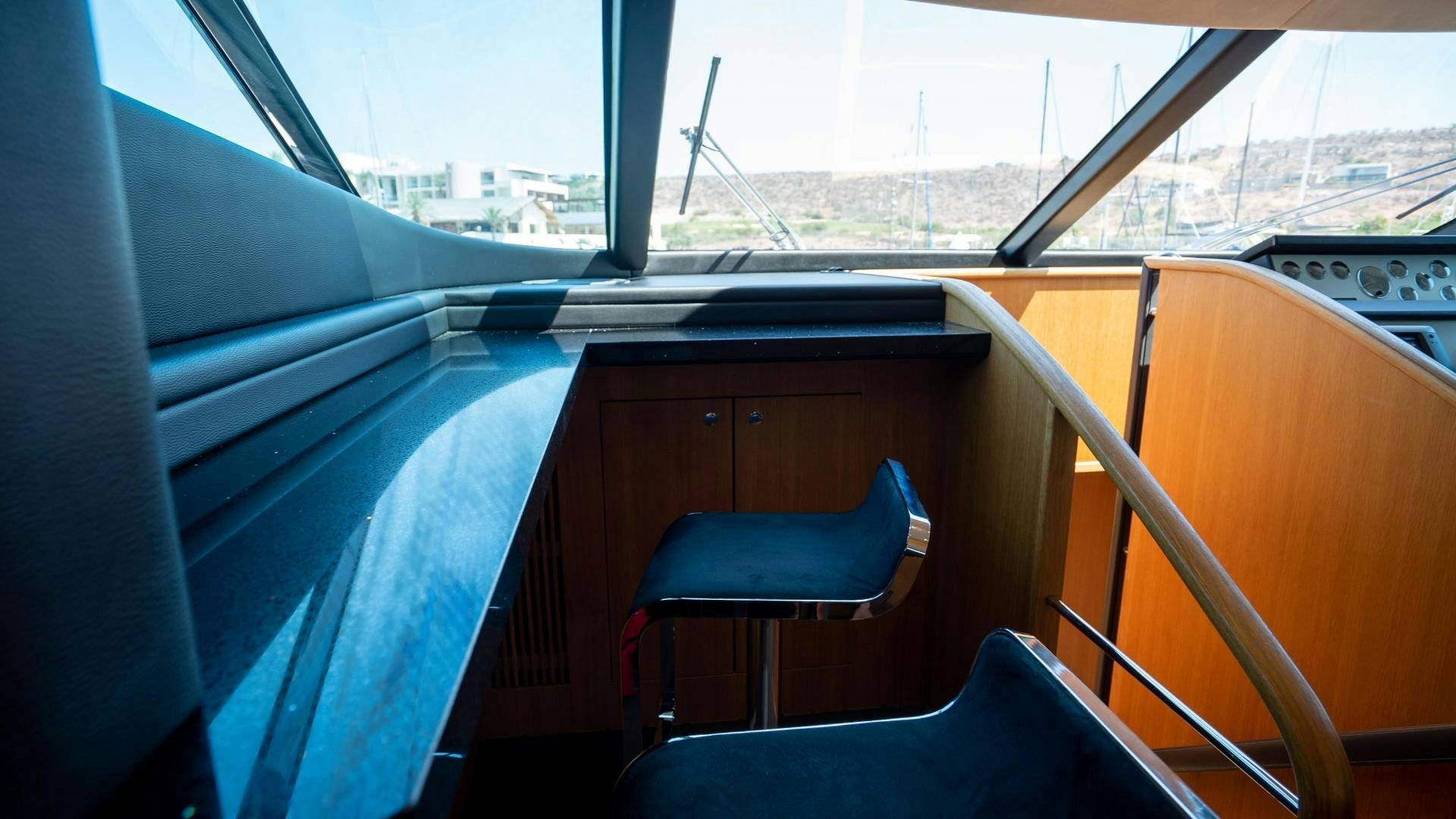 inside of a car aboard OCHO UNO Yacht for Sale